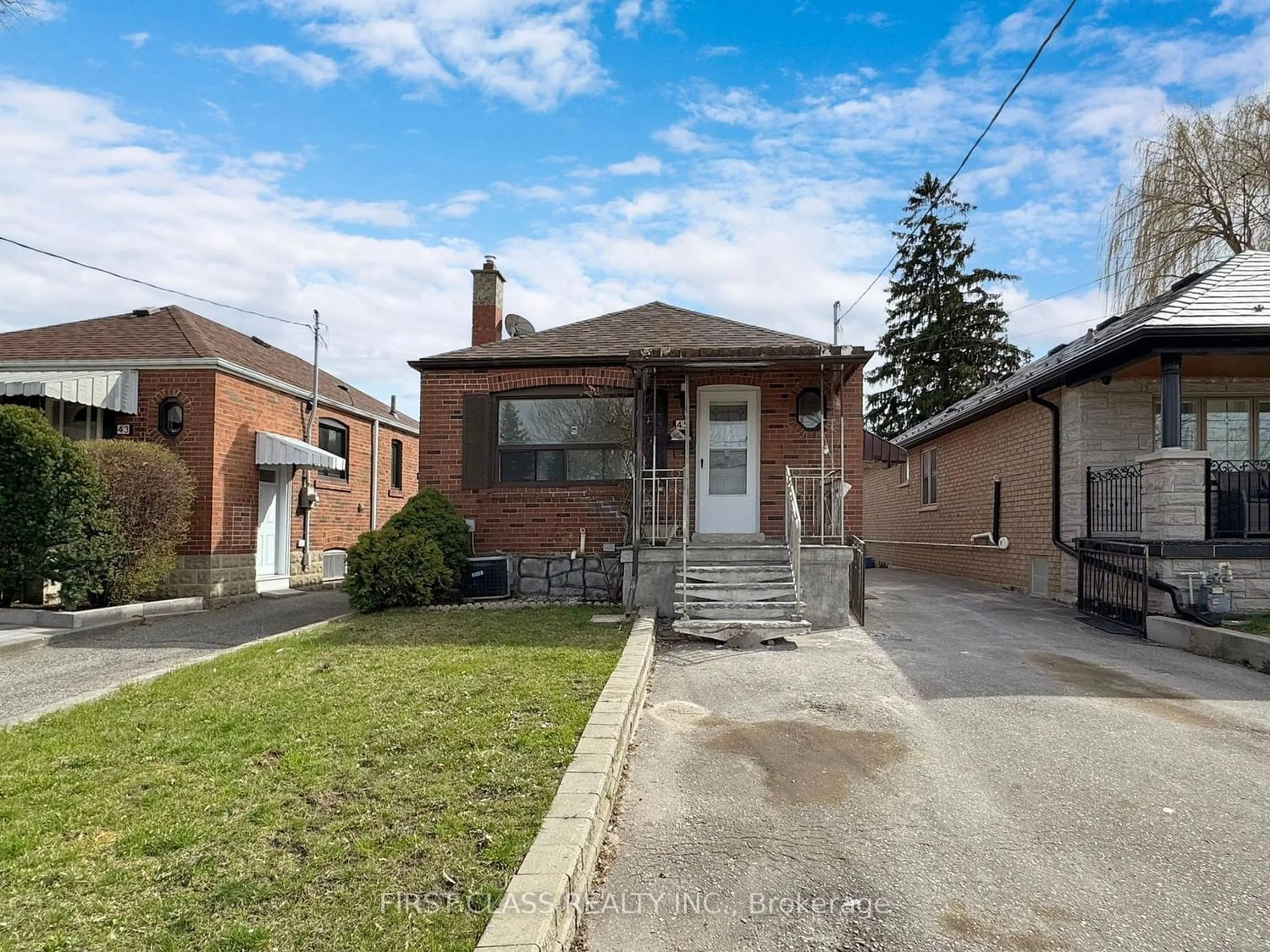 Frontside or backside of a home for 45 Juliet Cres, Toronto Ontario M6M 1N5
