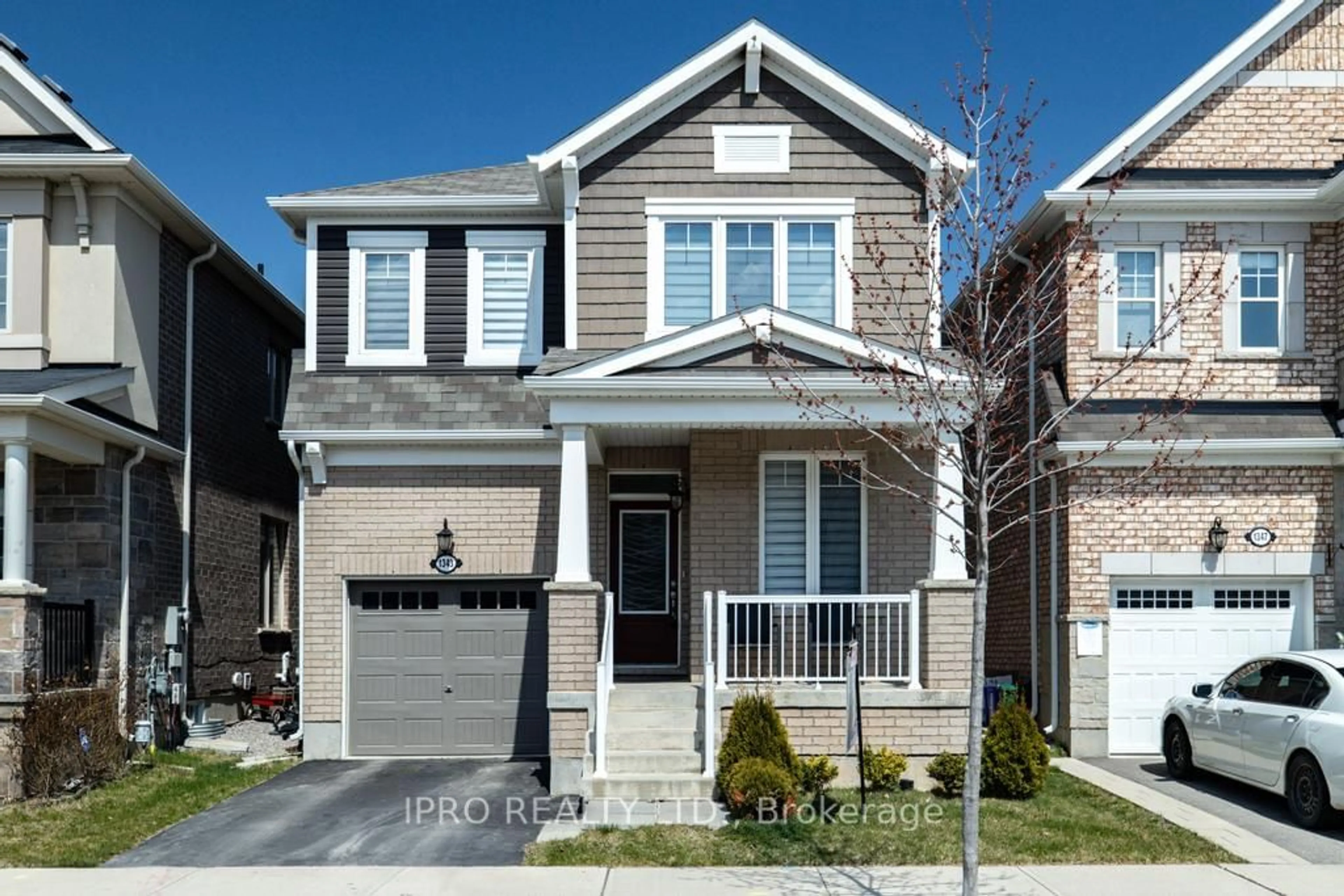 Frontside or backside of a home for 1343 Rose Way, Milton Ontario L9E 1M5