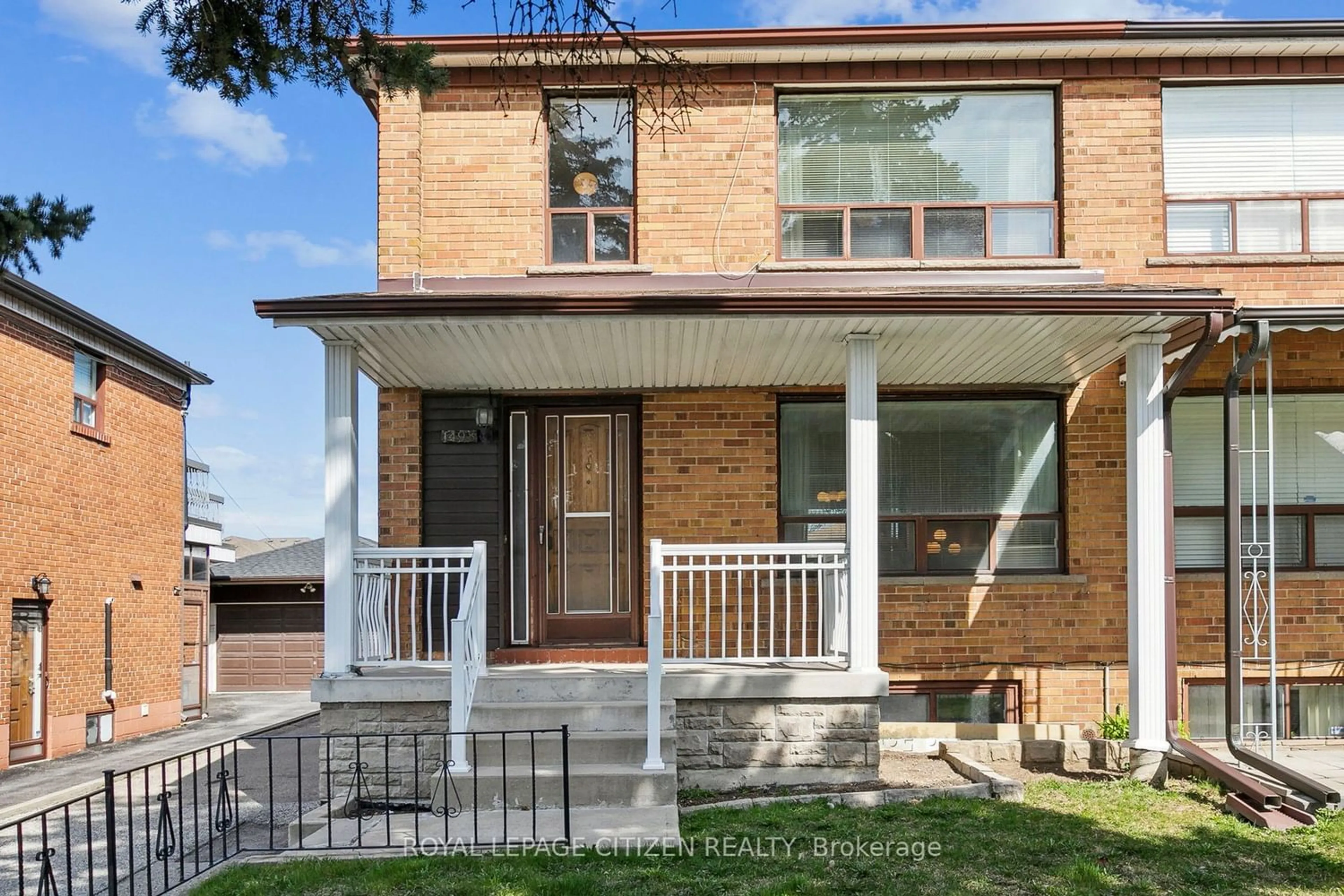 Home with brick exterior material for 1498 Lawrence Ave, Toronto Ontario M6L 1B6