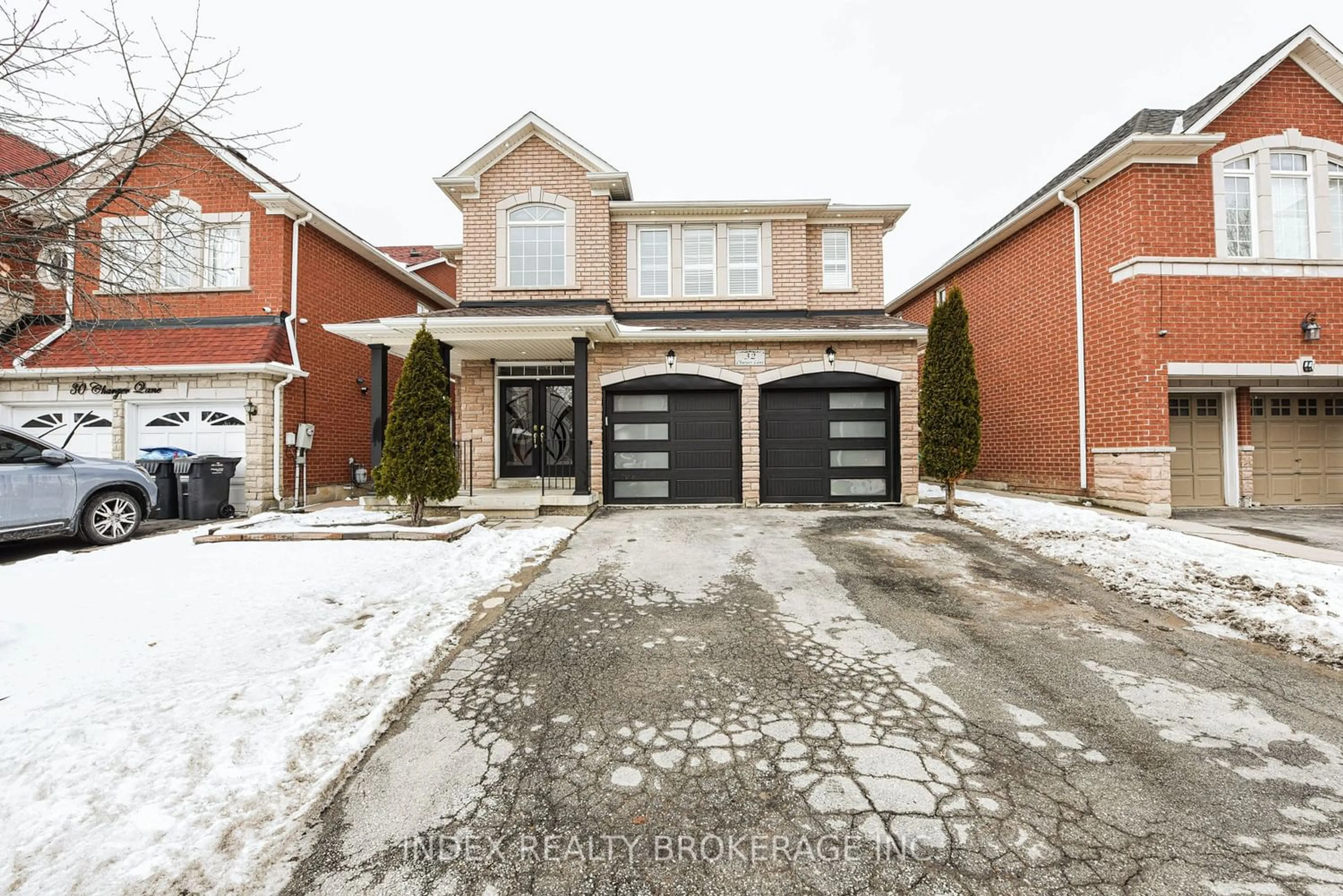 Home with brick exterior material for 32 Charger Lane, Brampton Ontario L7A 3C1