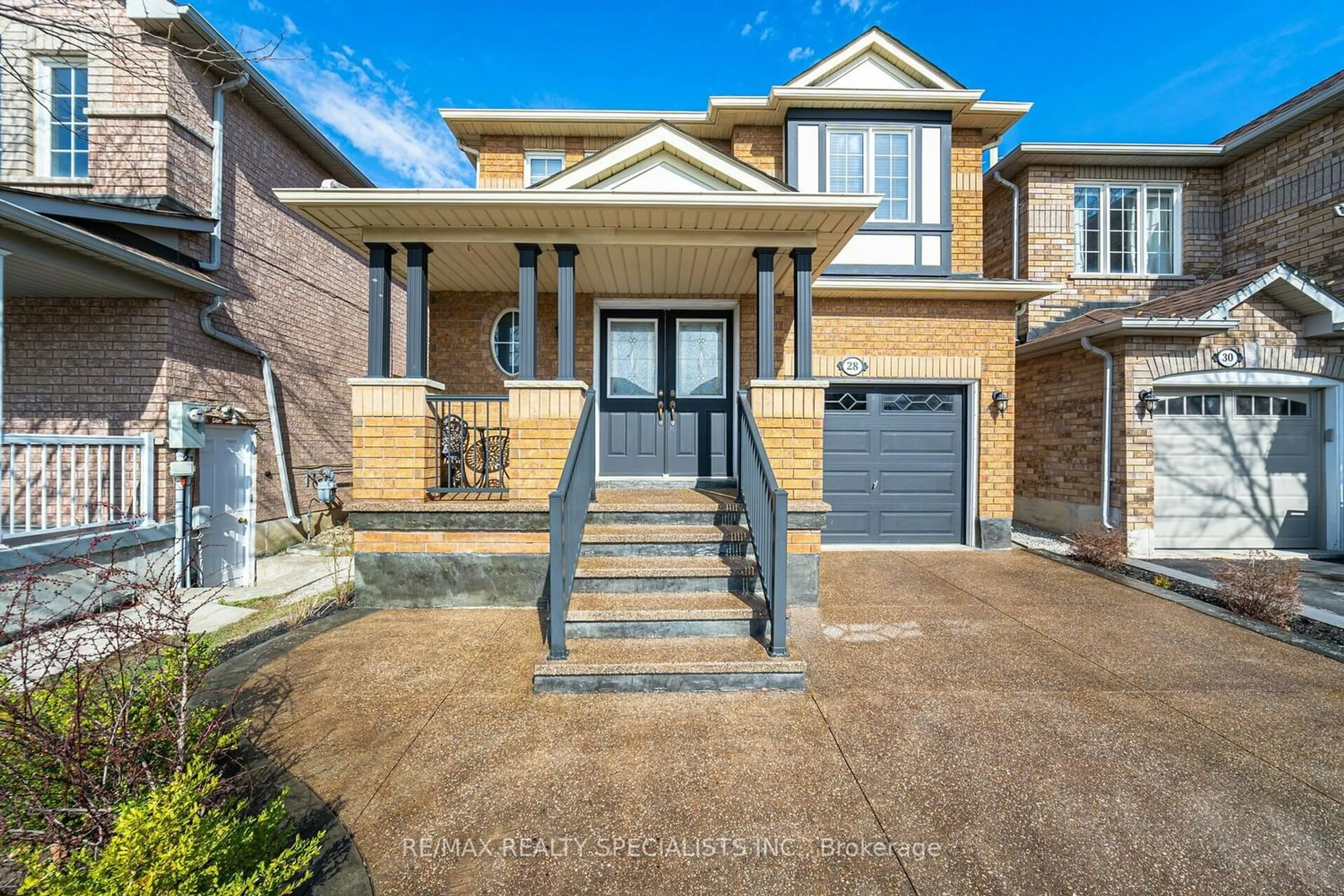 Home with brick exterior material for 28 Slessor Lane, Brampton Ontario L6P 1L8