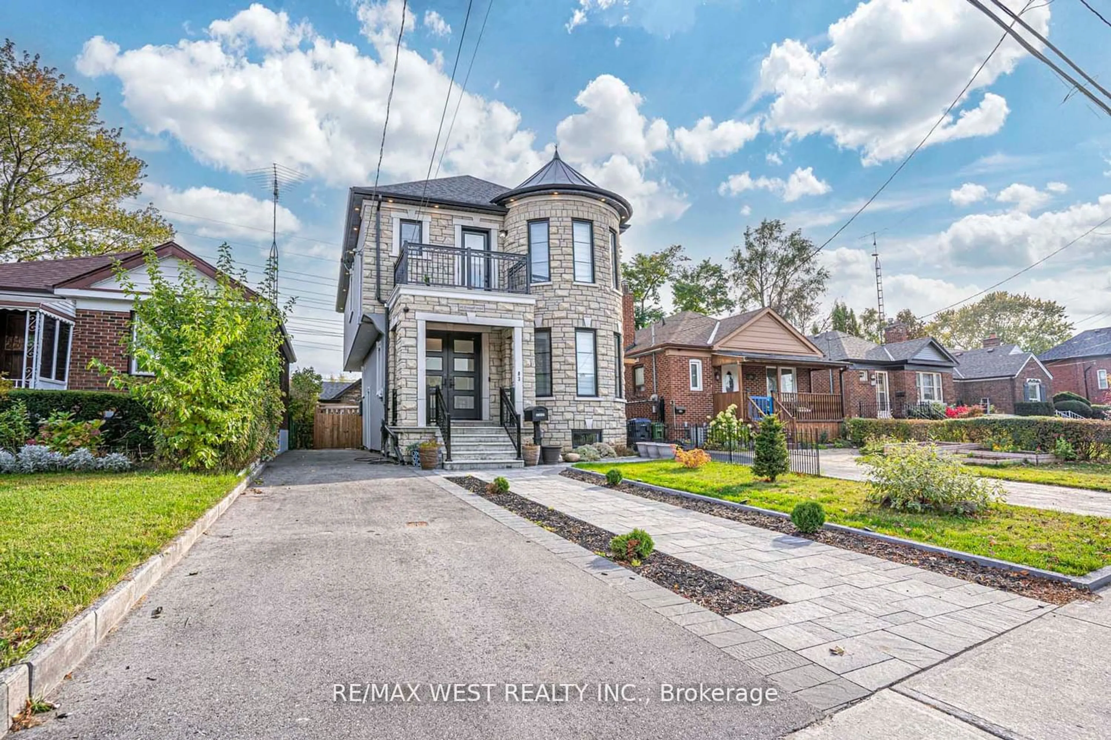 Frontside or backside of a home for 83 Foxwell St, Toronto Ontario M6N 1Y9