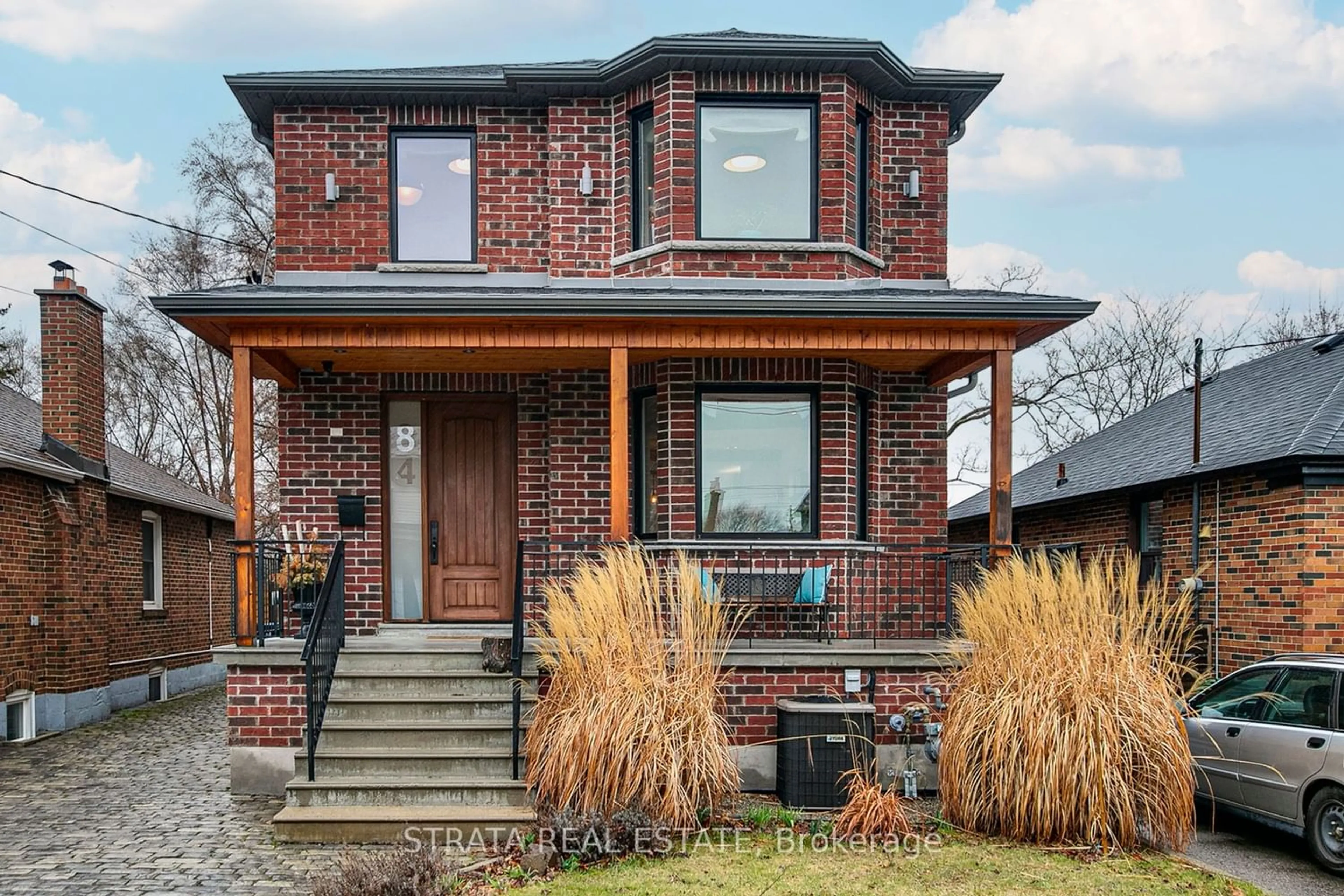 Home with brick exterior material for 84 Ellins Ave, Toronto Ontario M6N 2B1