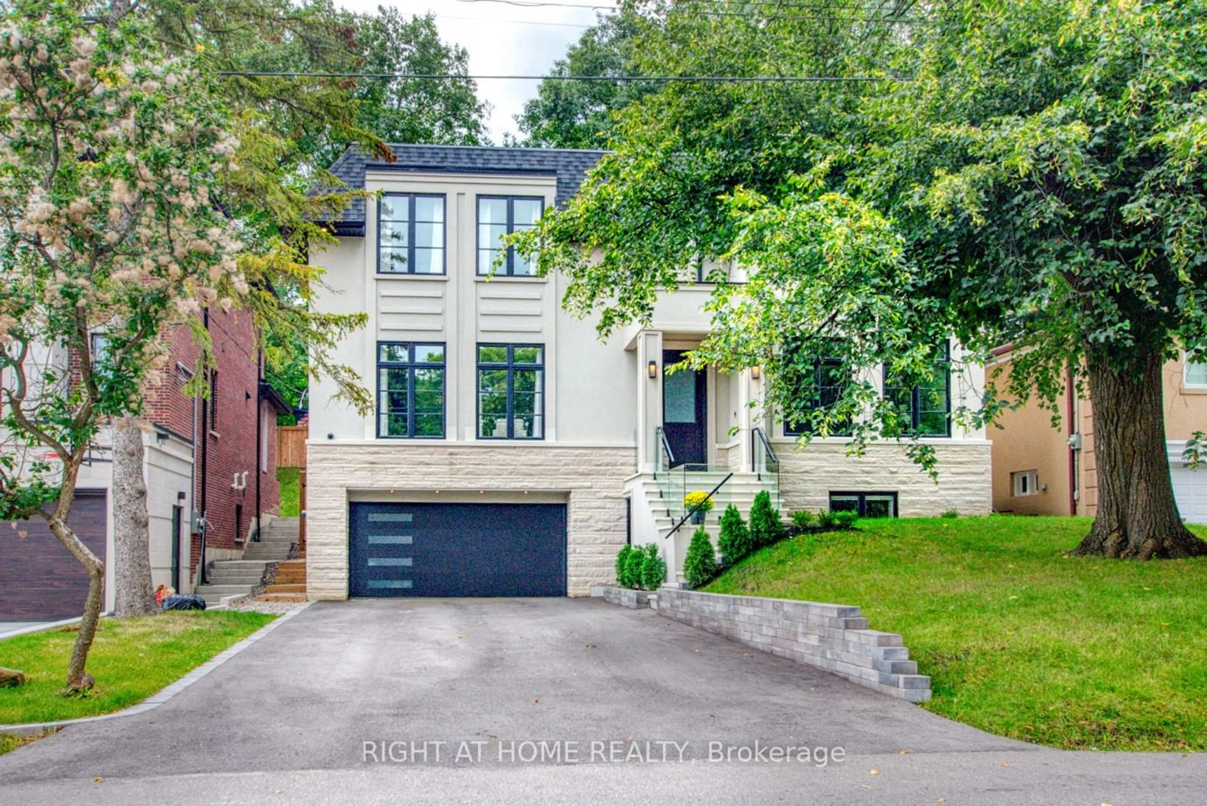 Home with brick exterior material for 29 Leland Ave, Toronto Ontario M8Z 2X6