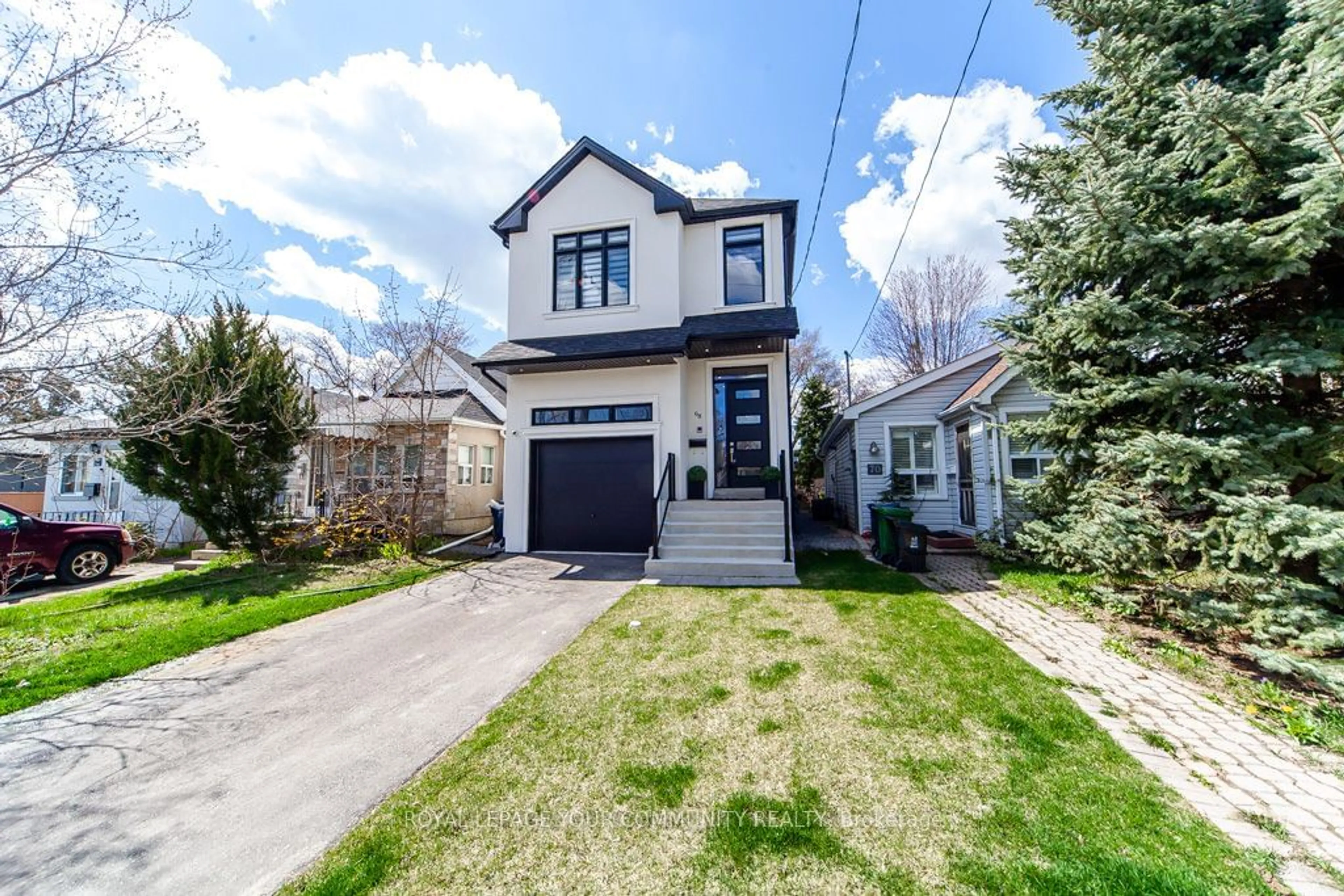 Frontside or backside of a home for 68 Twenty Fourth St, Toronto Ontario M8V 3N8