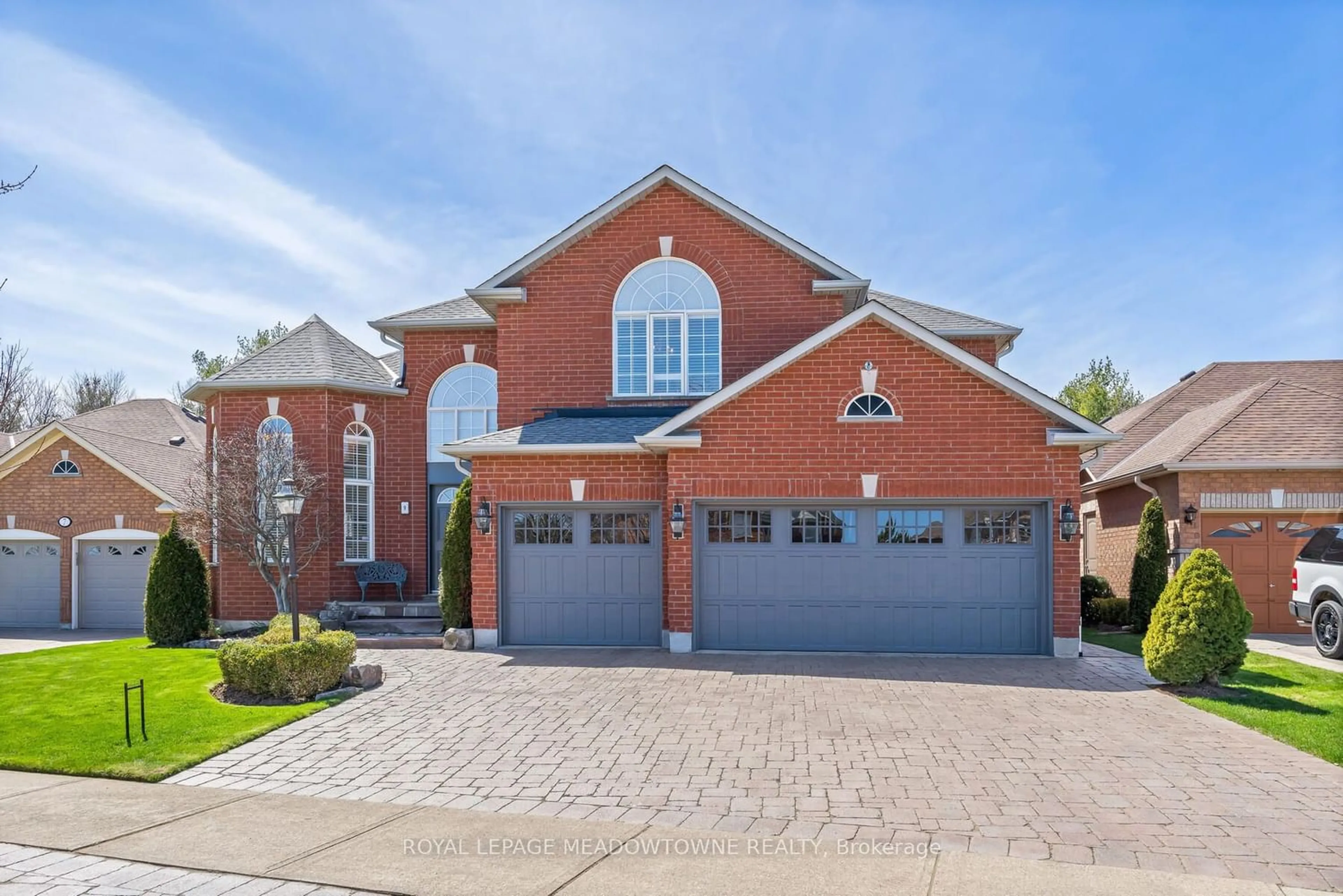 Home with brick exterior material for 9 Poets Path, Halton Hills Ontario L7G 5Z9