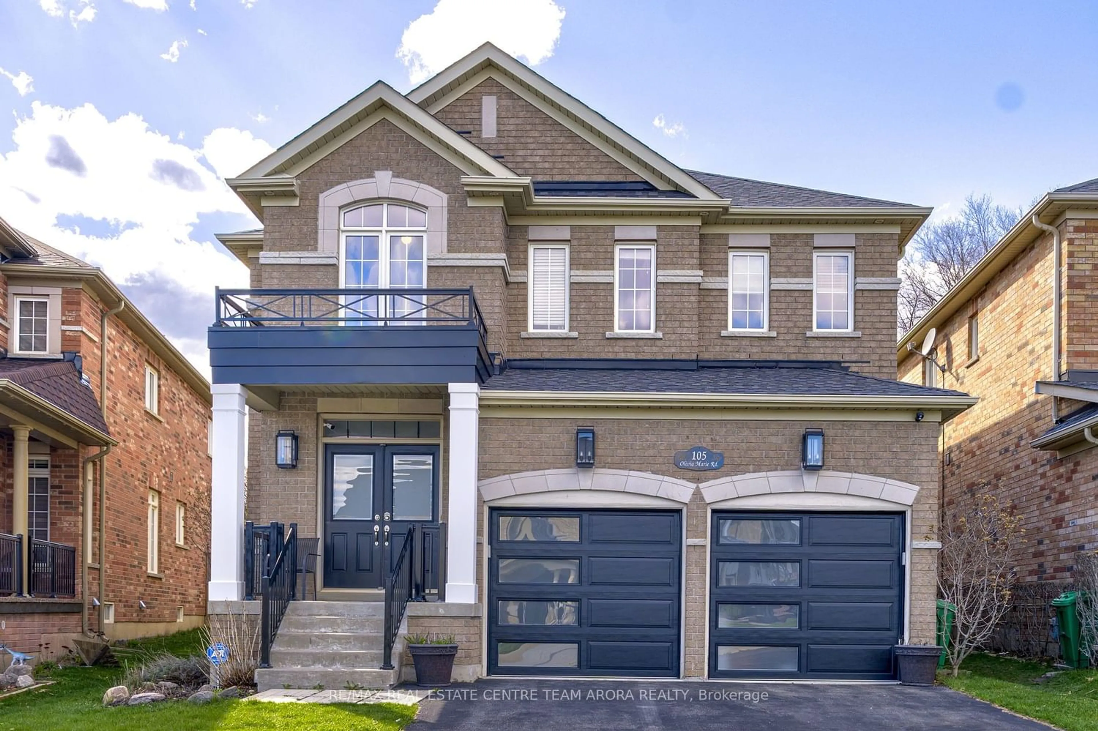 Home with brick exterior material for 105 Olivia Marie Rd, Brampton Ontario L6Y 0N1