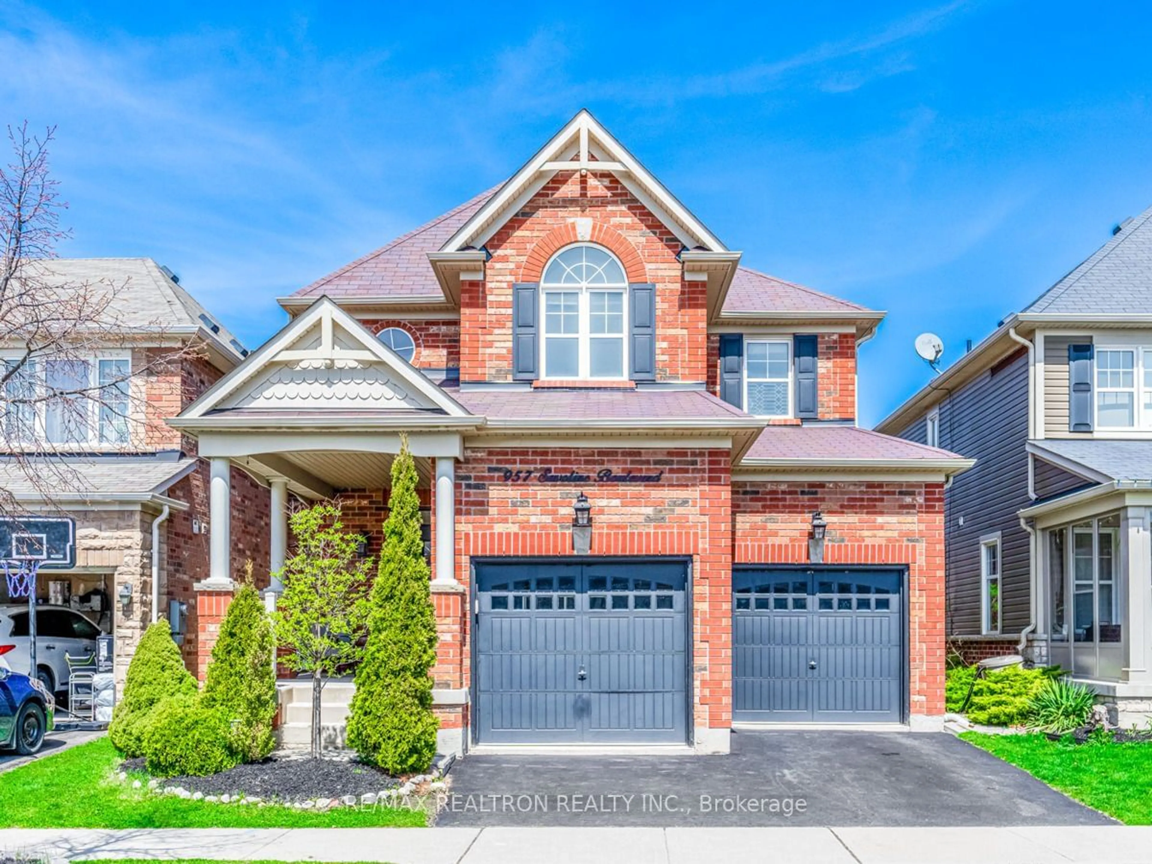 Home with brick exterior material for 957 Savoline Blvd, Milton Ontario L9T 0Z9