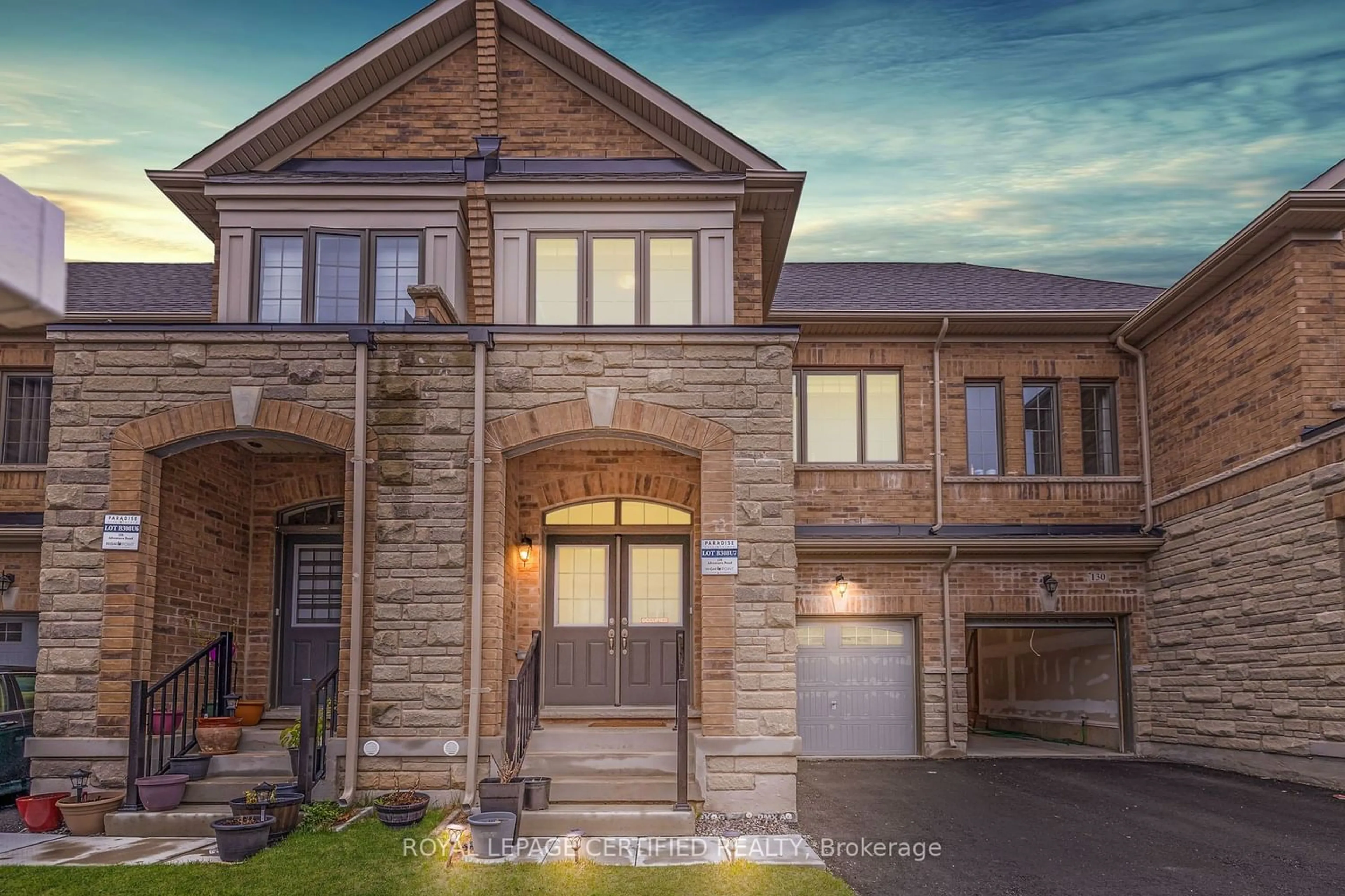 Home with brick exterior material for 128 Adventura Rd, Brampton Ontario L7A 5A7