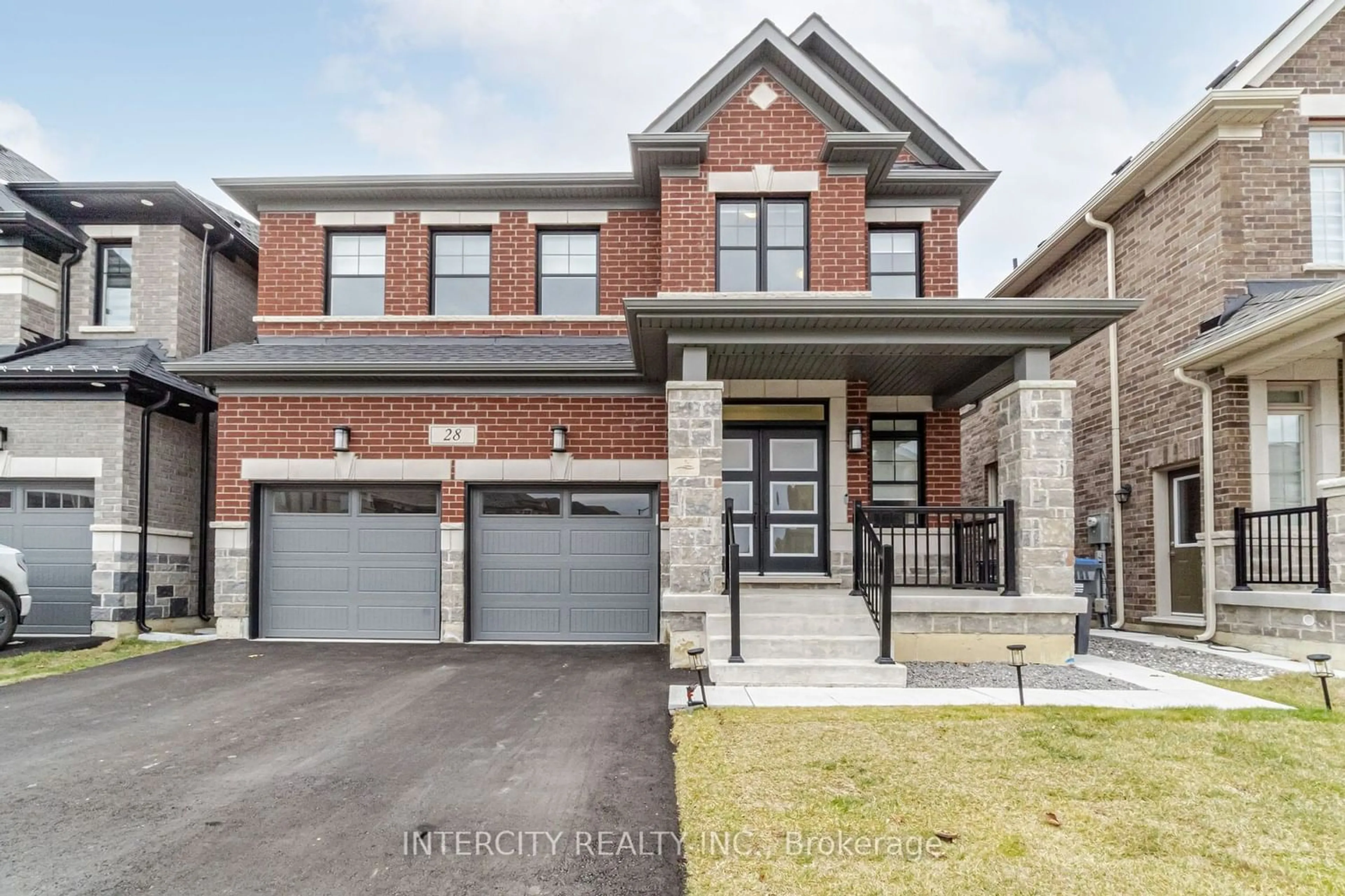Home with brick exterior material for 28 Affusion Rd, Brampton Ontario L7A 5G1