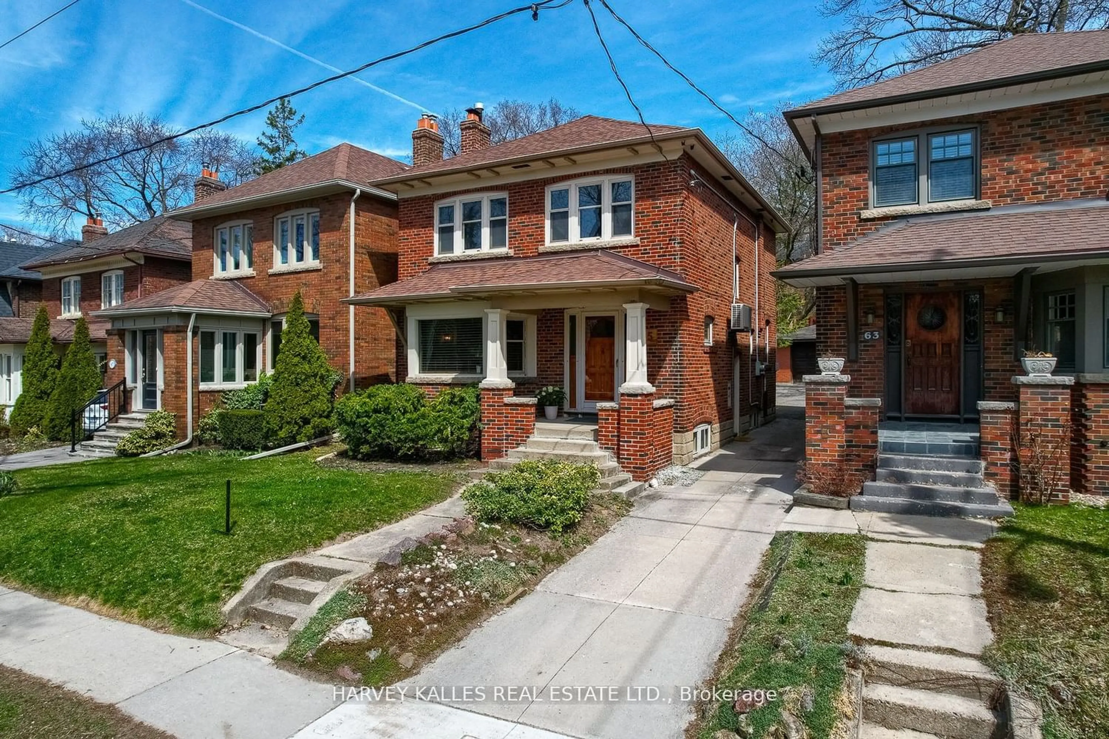 Home with brick exterior material for 65 Old Mill Dr, Toronto Ontario M6S 4J8
