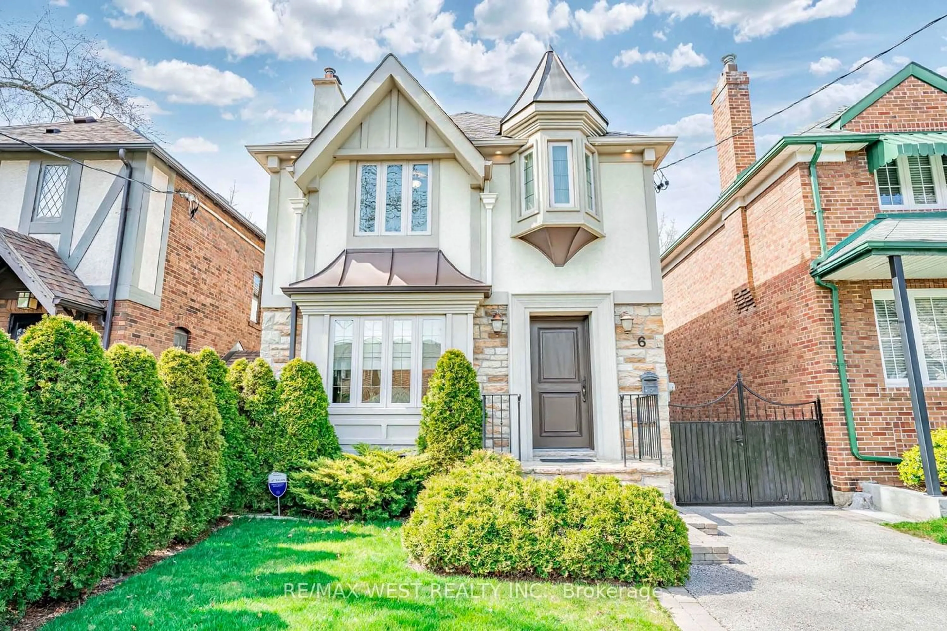 Home with brick exterior material for 6 Armadale Ave, Toronto Ontario M6S 3W8