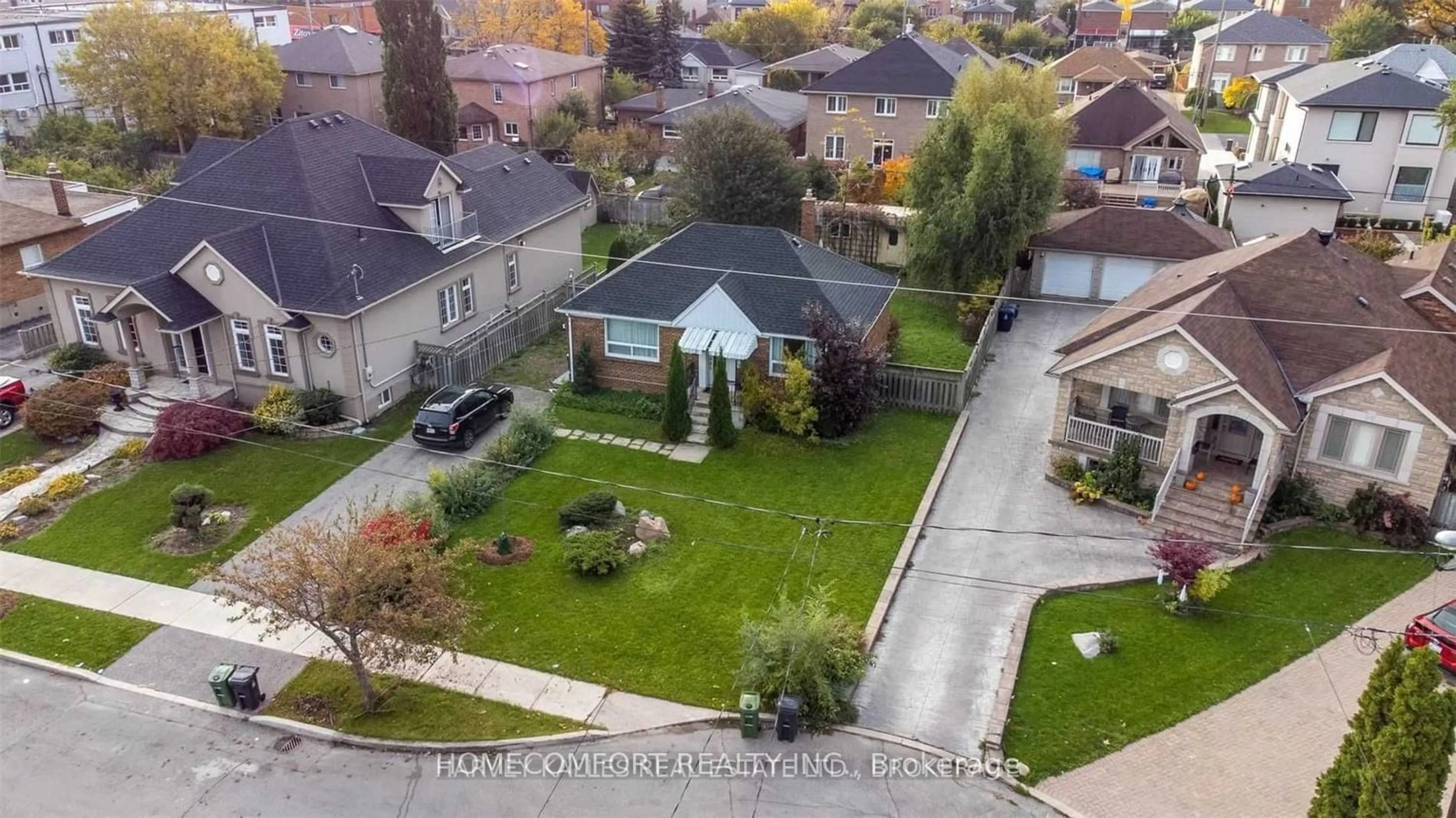 Frontside or backside of a home for 11 Enid Cres, Toronto Ontario M6B 1R9