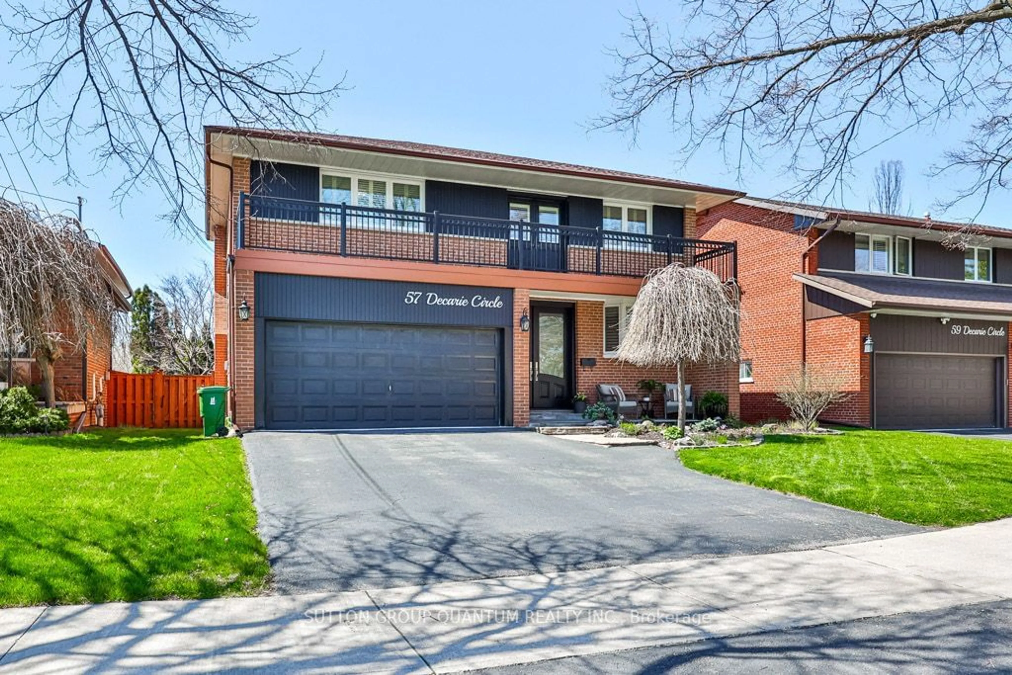 Home with brick exterior material for 57 Decarie Circ, Toronto Ontario M9B 3J1