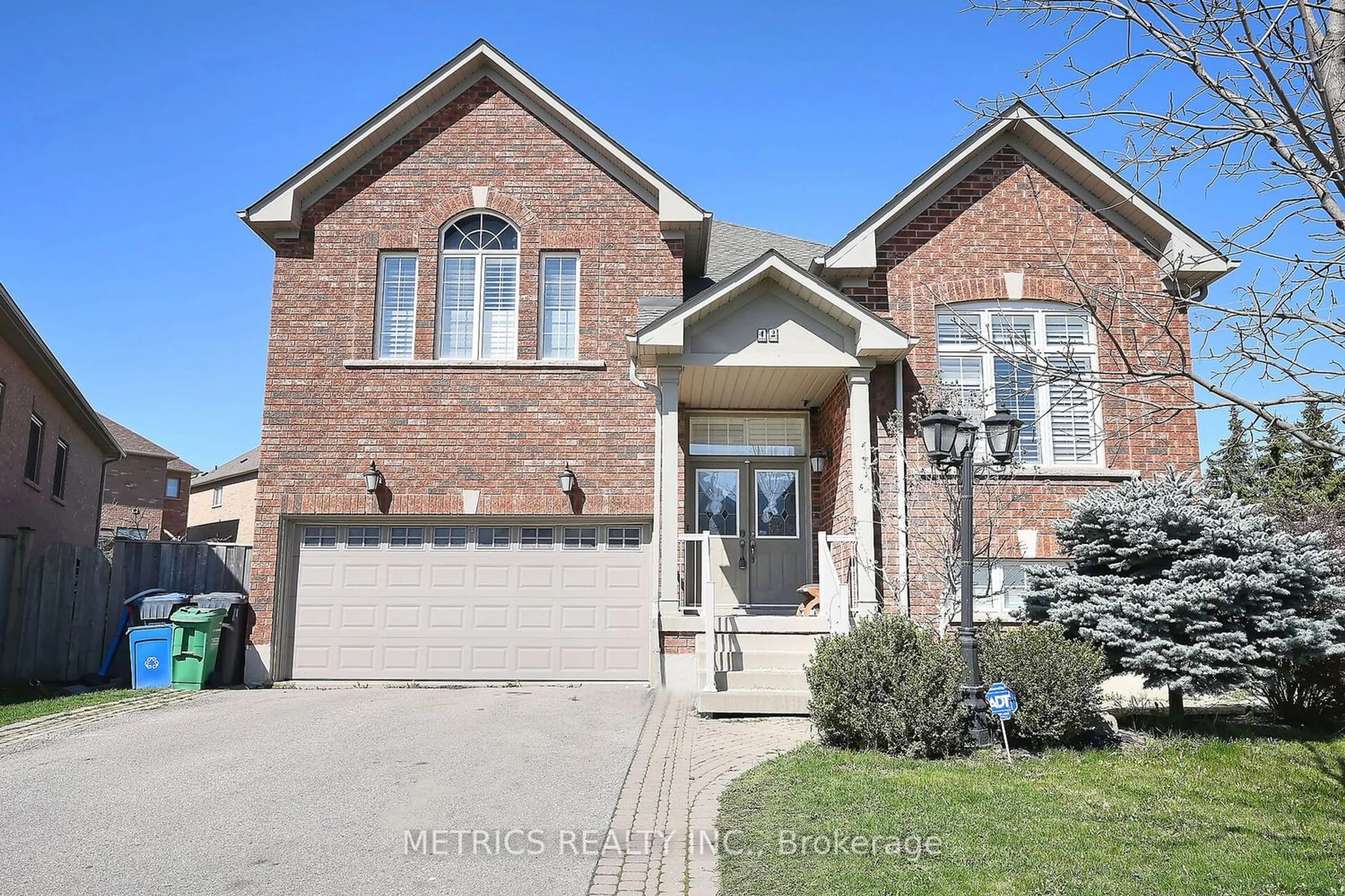 Home with brick exterior material for 42 Carmel Cres, Brampton Ontario L6P 1Y2