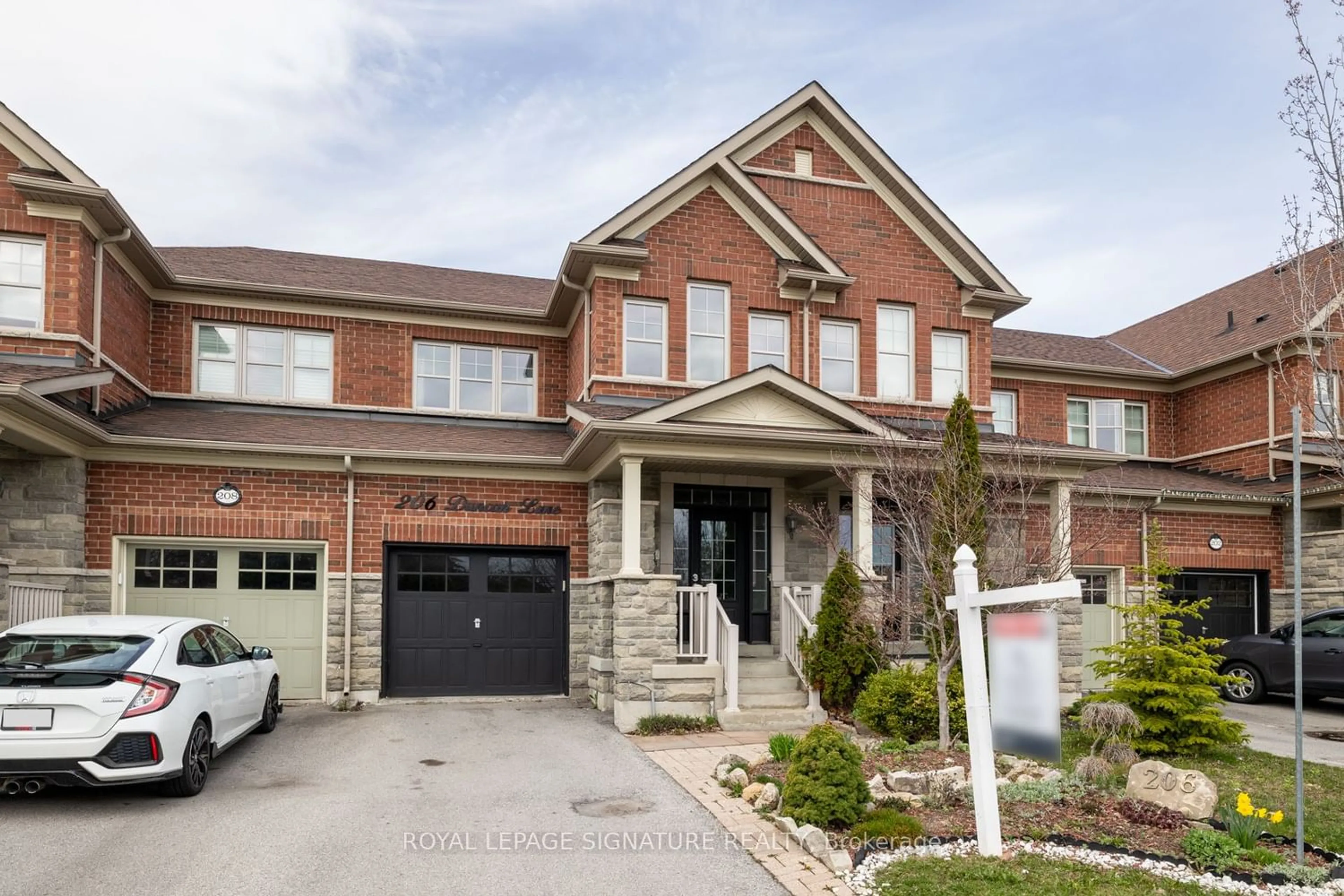 Home with brick exterior material for 206 Duncan Lane, Milton Ontario L9T 8B6