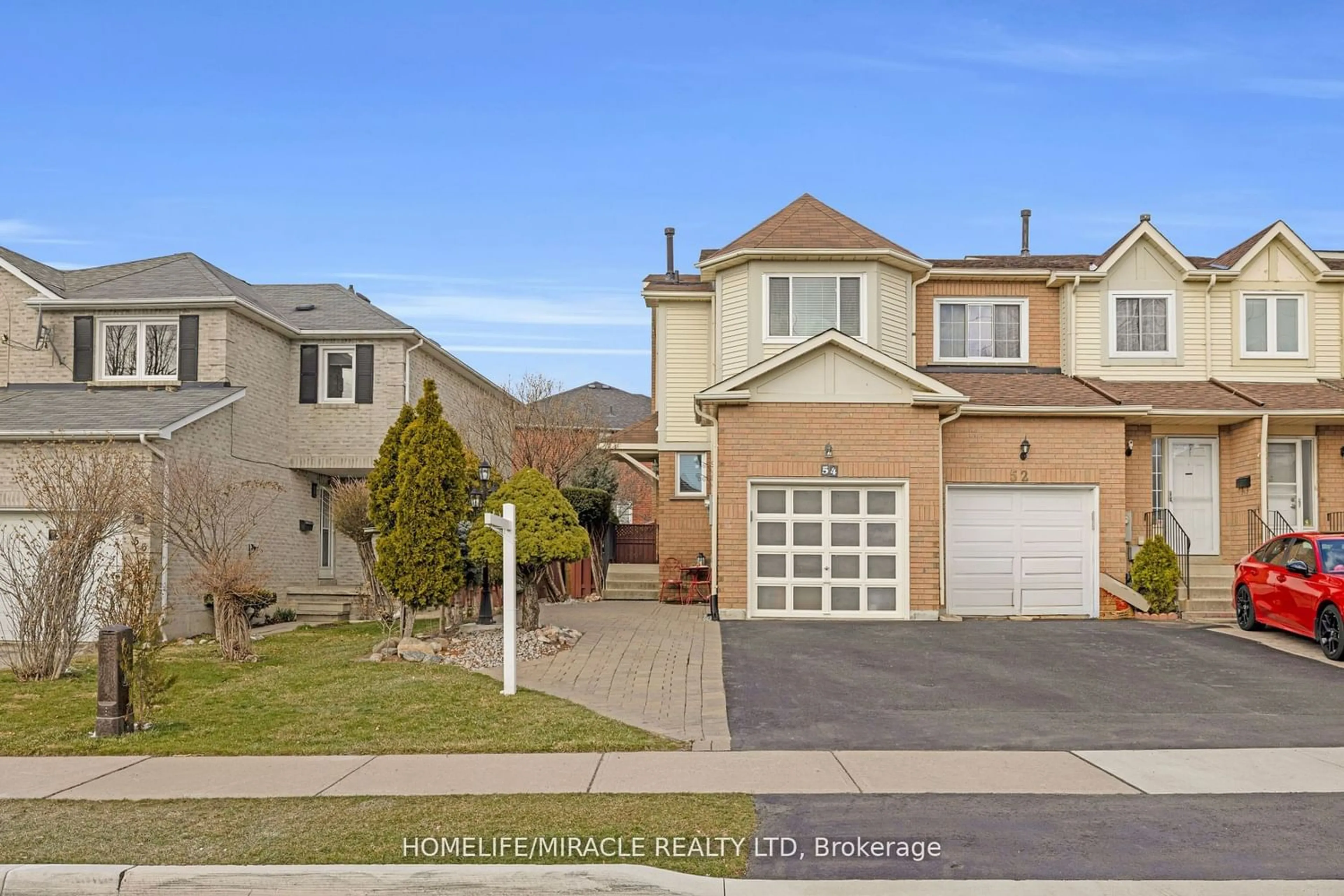 Frontside or backside of a home for 54 Millstone Dr, Brampton Ontario L6Y 4P5