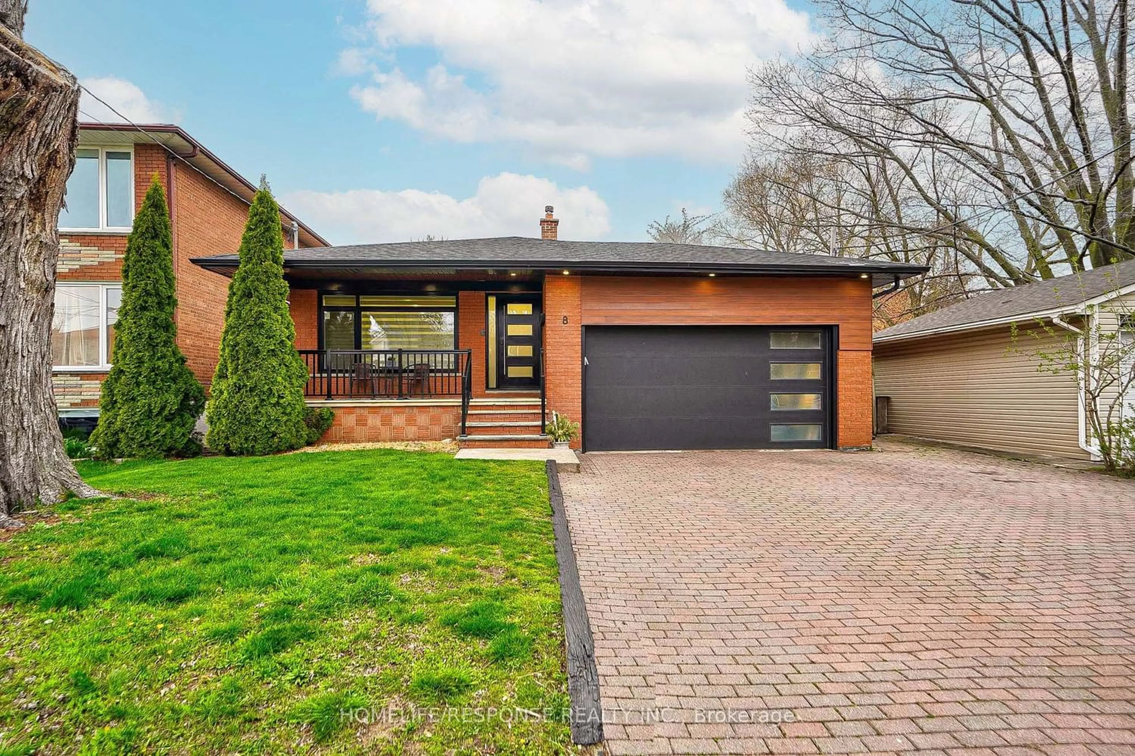 Home with brick exterior material for 8 Alcan Ave, Toronto Ontario M8W 1V1