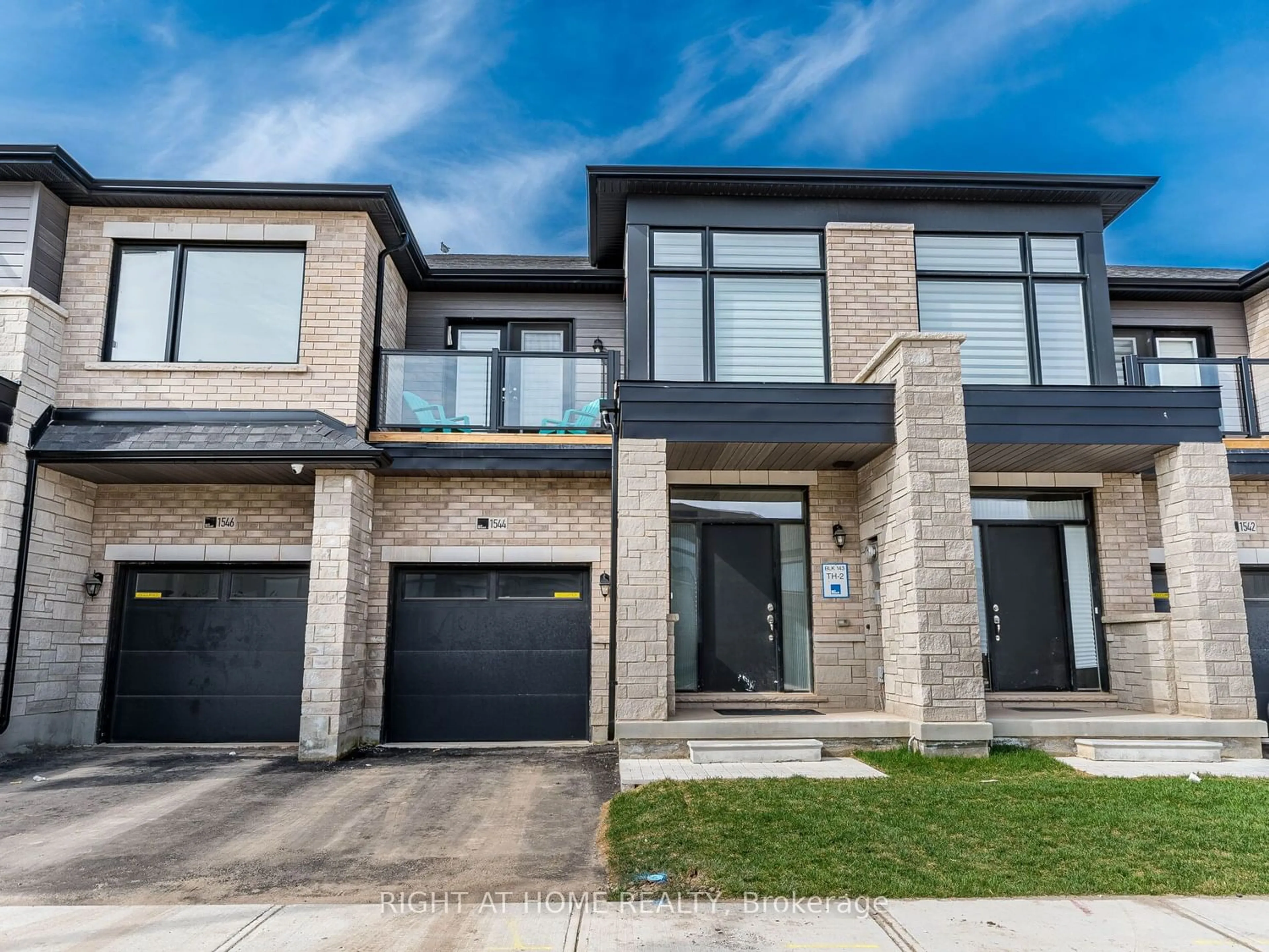 Home with brick exterior material for 1544 Rose Way, Milton Ontario L9E 1V8