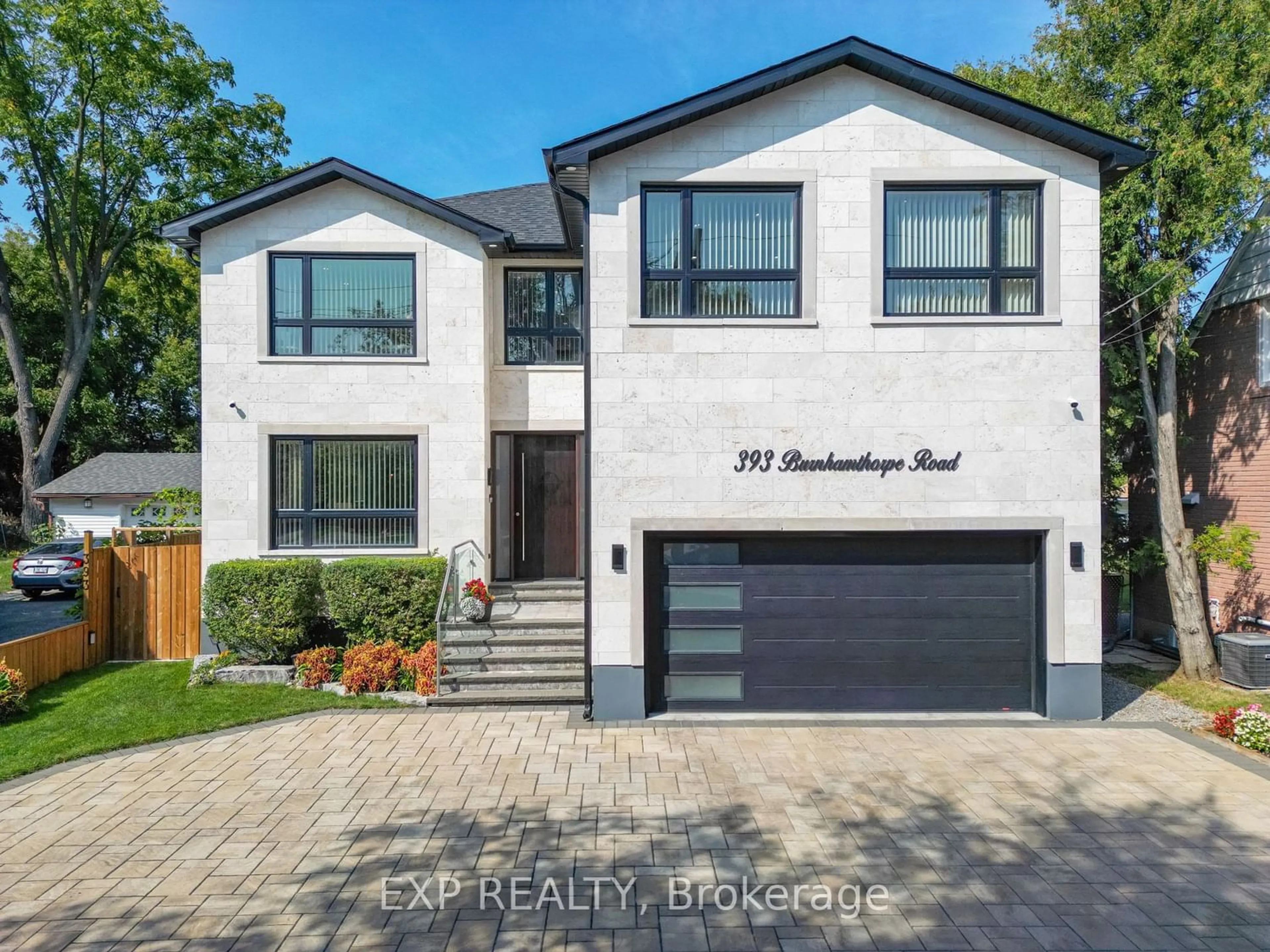 Home with brick exterior material for 393 Burnhamthorpe Rd, Toronto Ontario M9B 2A7