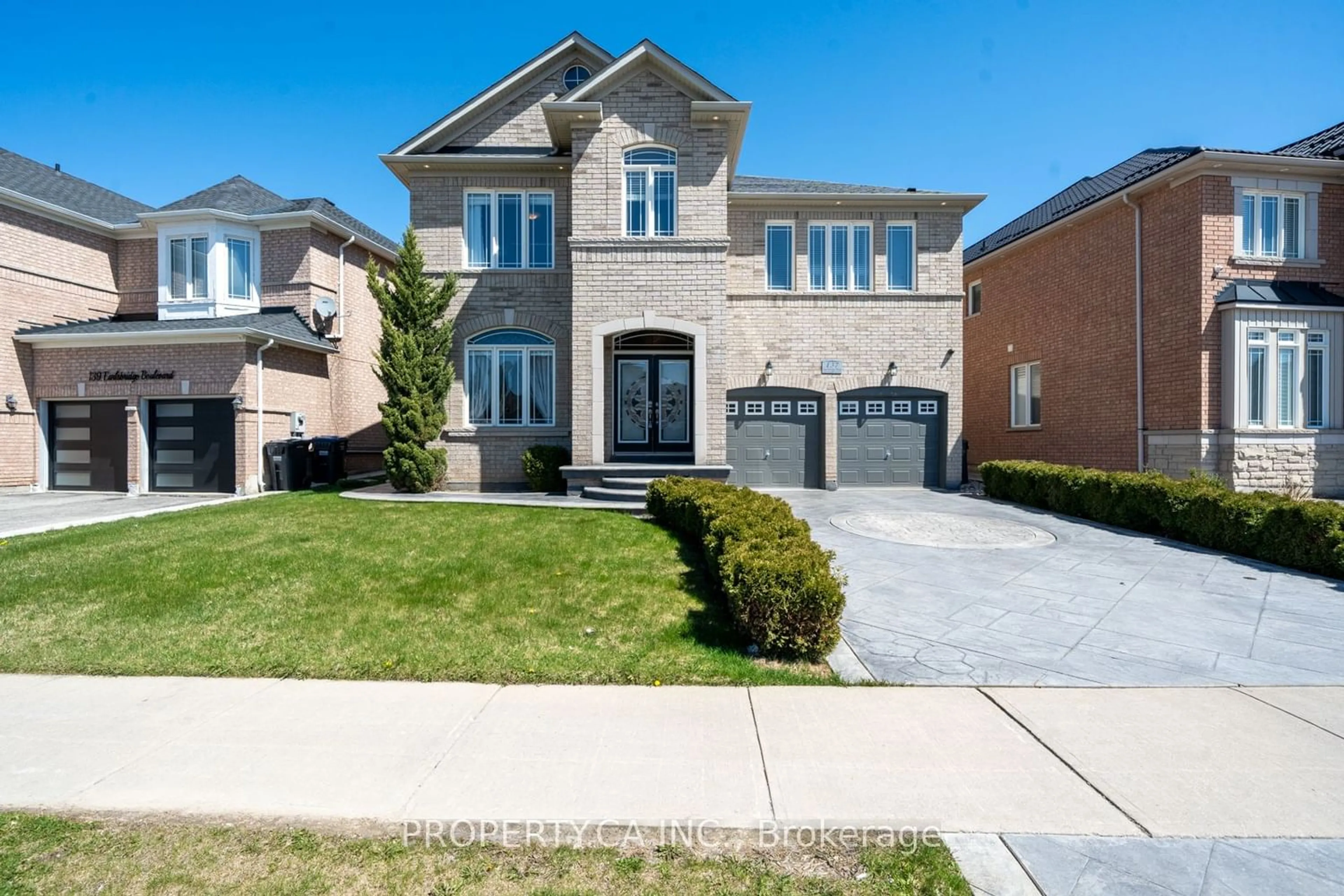 Home with brick exterior material for 137 Earlsbridge Blvd, Brampton Ontario L7A 3T7