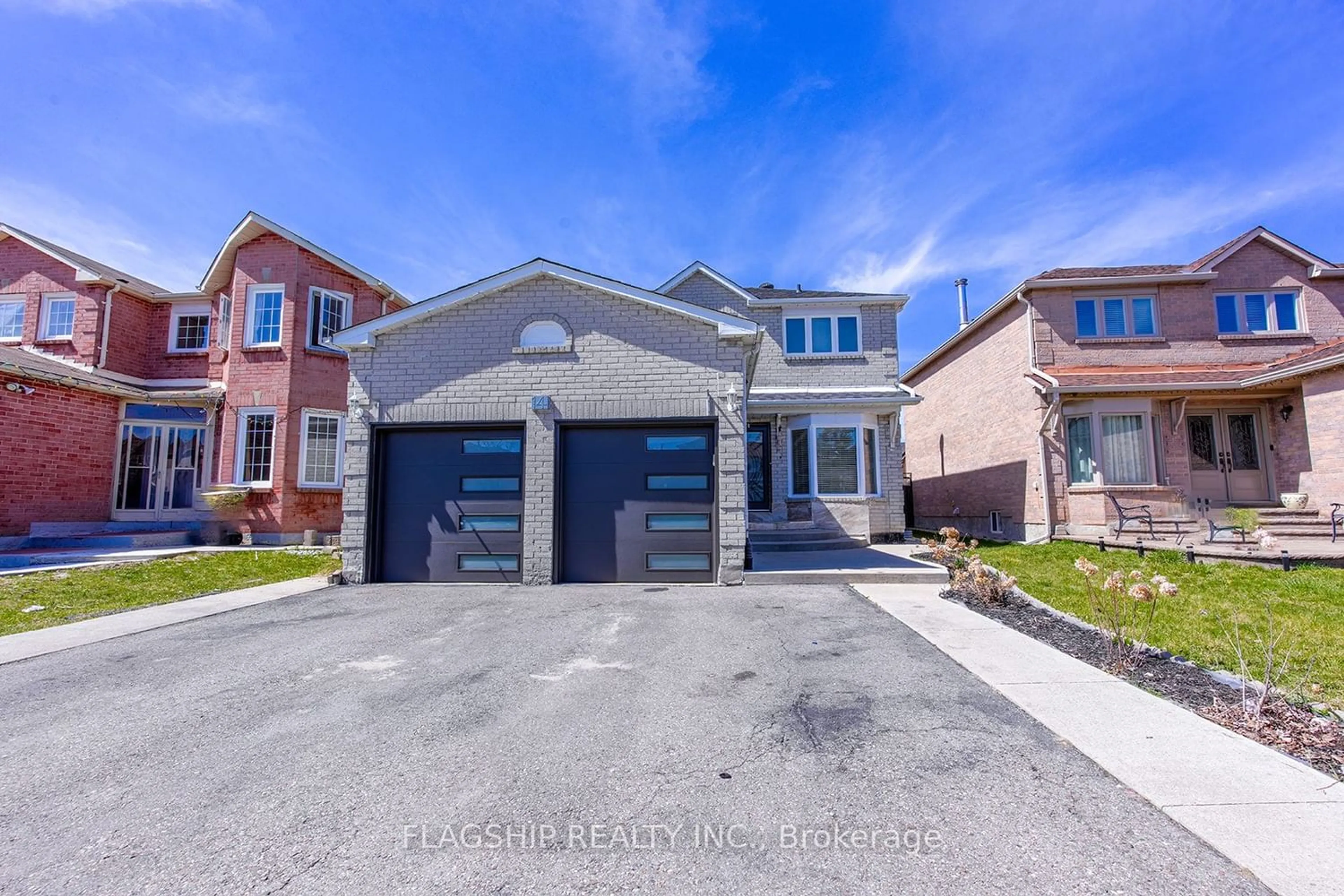 Frontside or backside of a home for 14 Songsparrow Dr, Brampton Ontario L6Y 3Z8