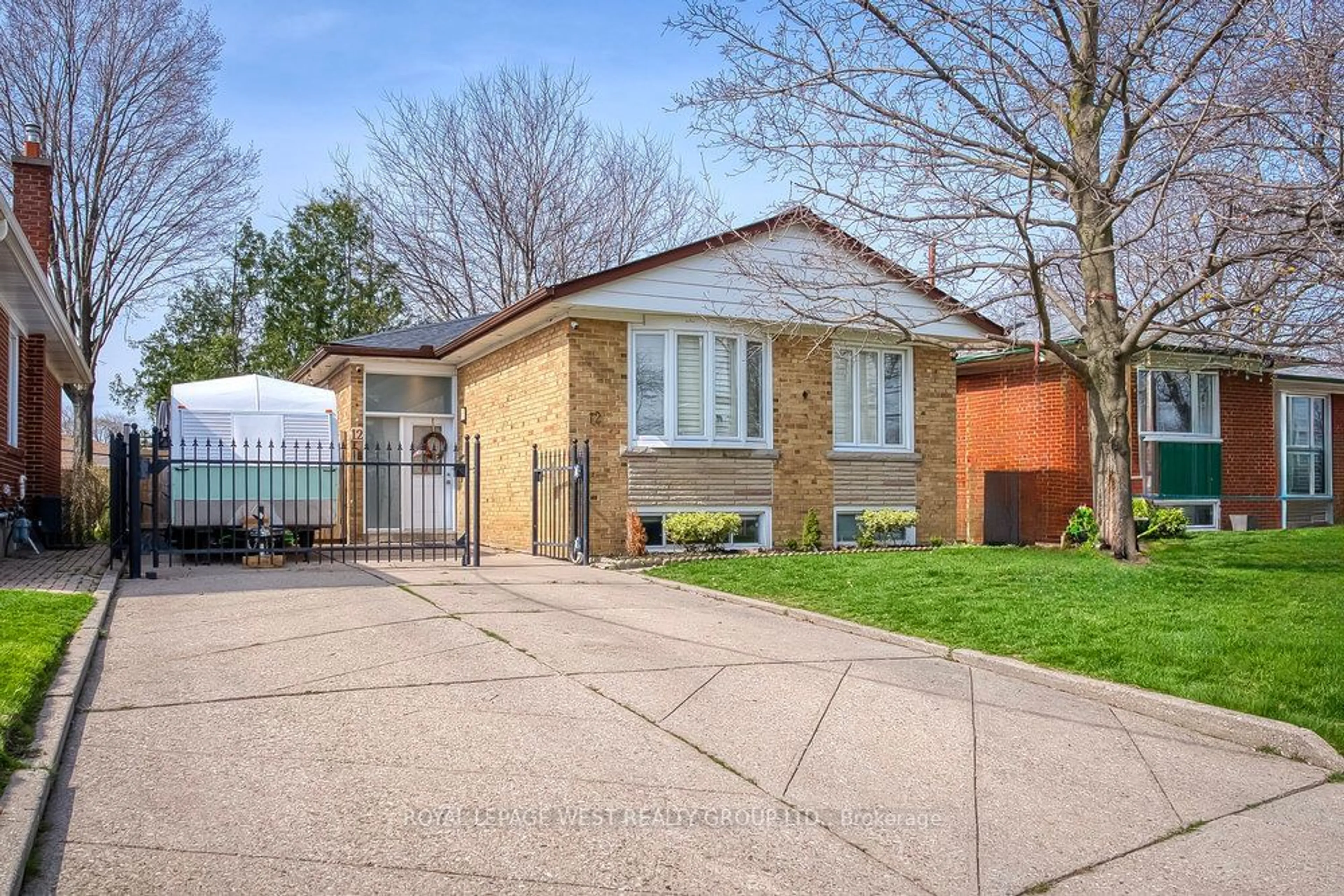 Home with brick exterior material for 12 Leavenworth Cres, Toronto Ontario M9C 1T4