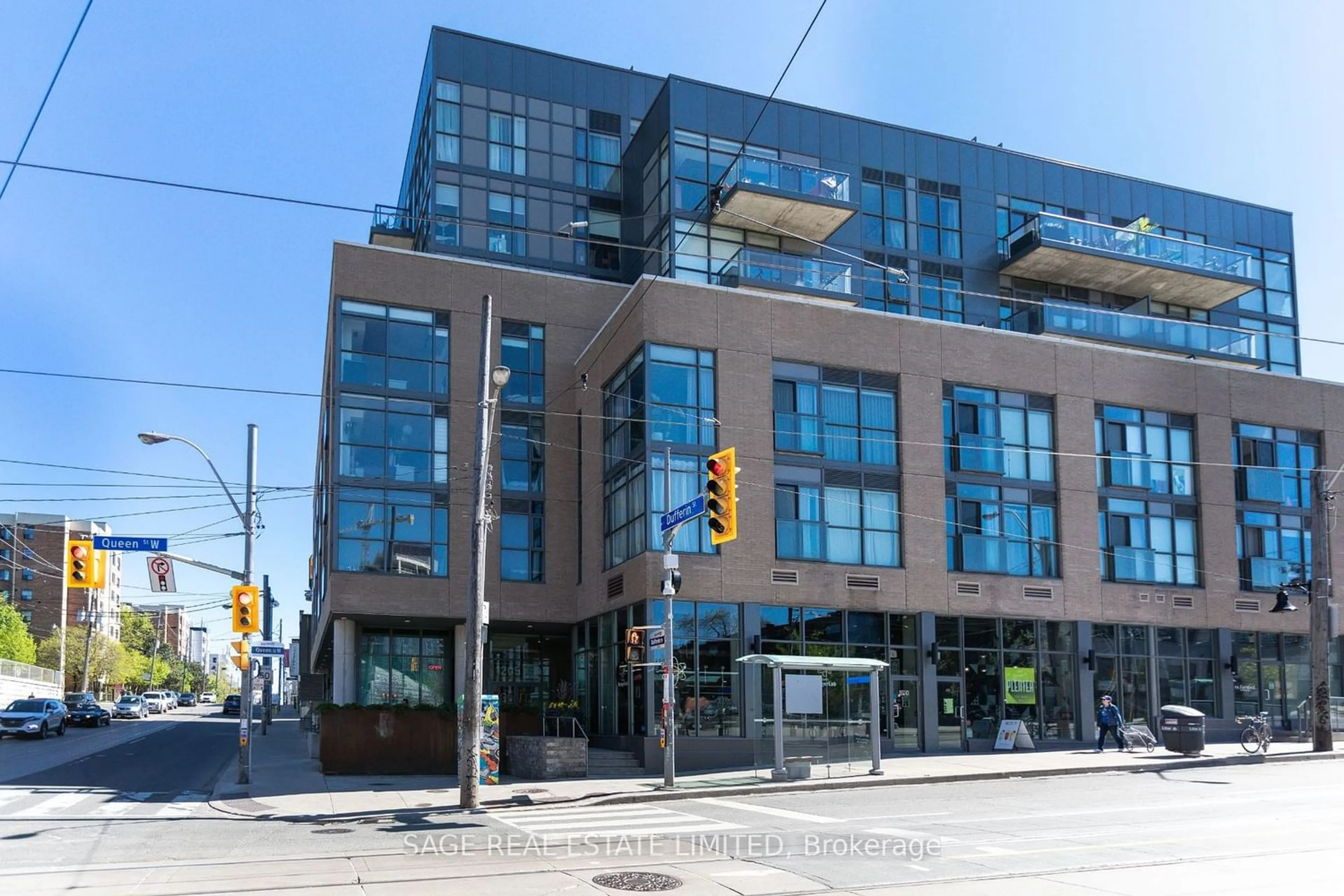 A pic from exterior of the house or condo for 1205 Queen St #209, Toronto Ontario M6K 0B9
