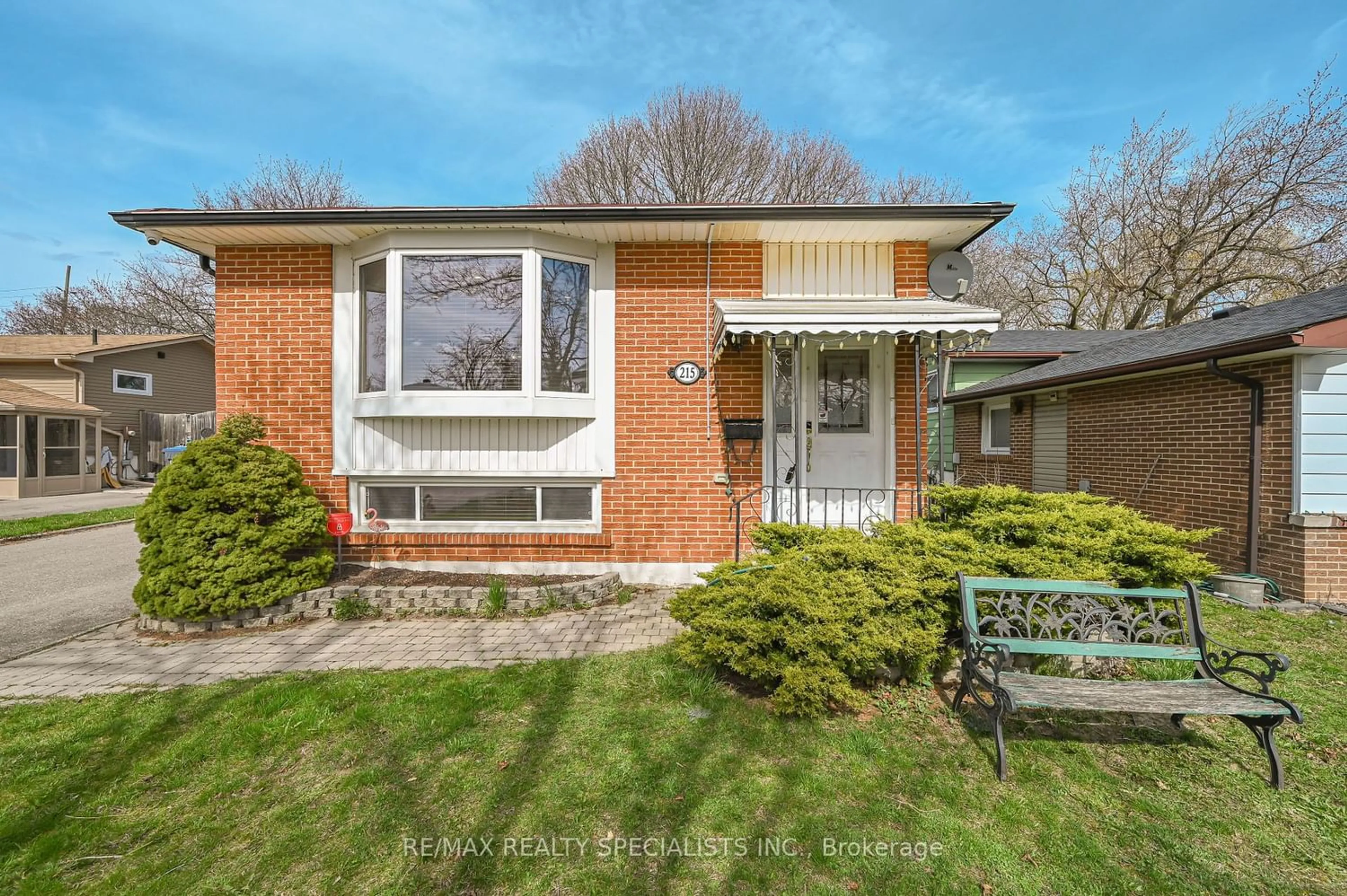 Home with brick exterior material for 215 Archdekin Dr, Brampton Ontario L6V 1V8