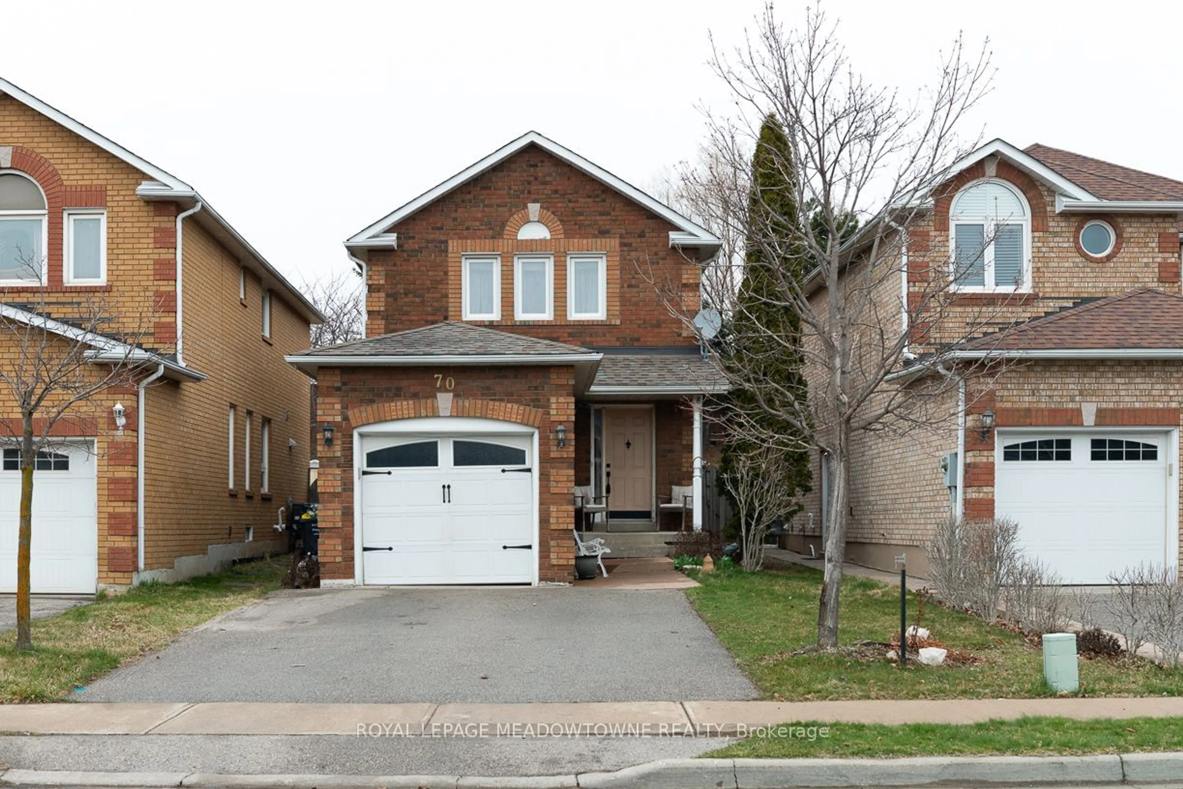 Home with brick exterior material for 70 Ravenscliff Crt, Brampton Ontario L6X 4N9