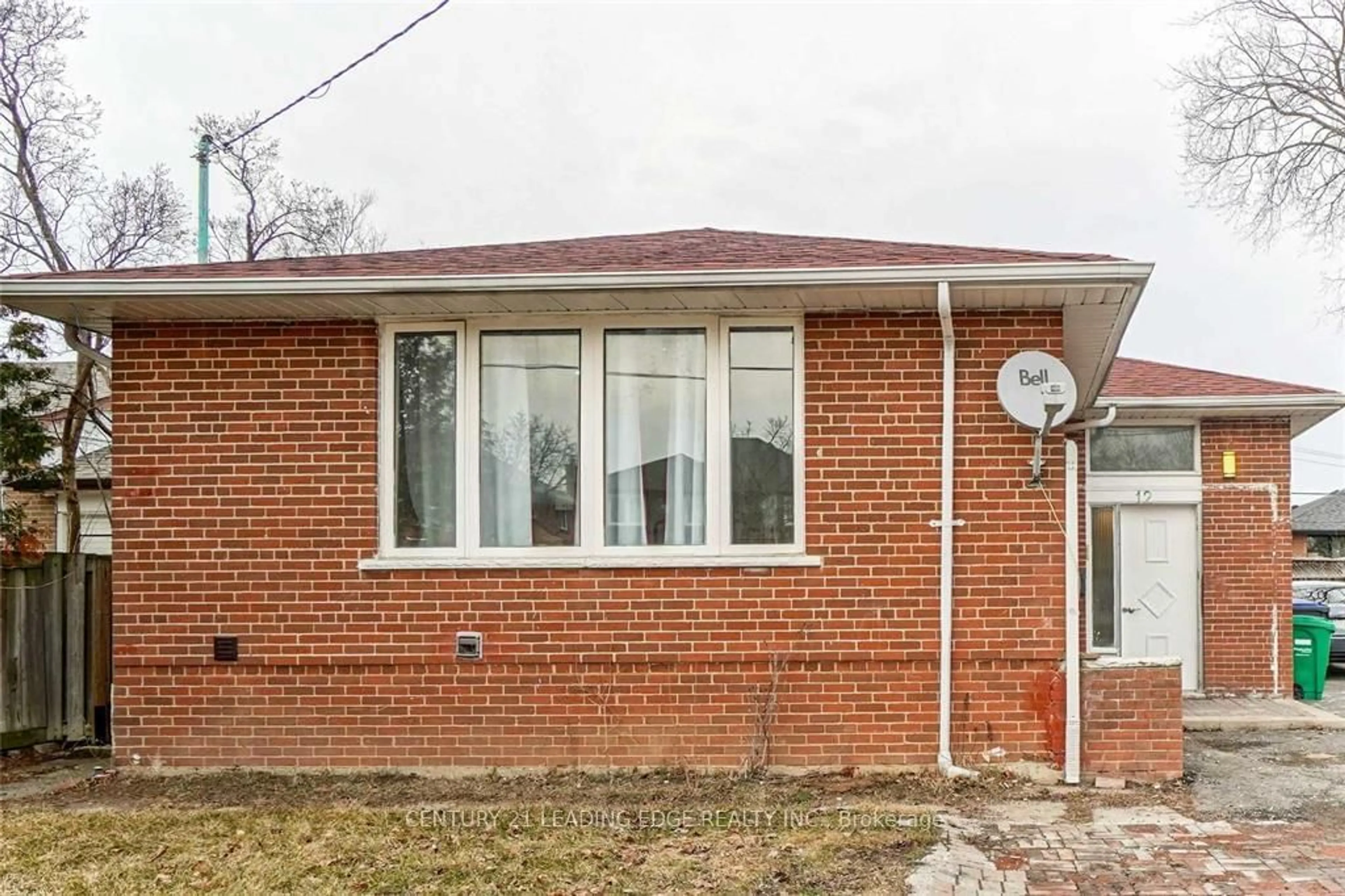 Home with brick exterior material for 12 Norfolk Ave, Brampton Ontario L6X 2B5