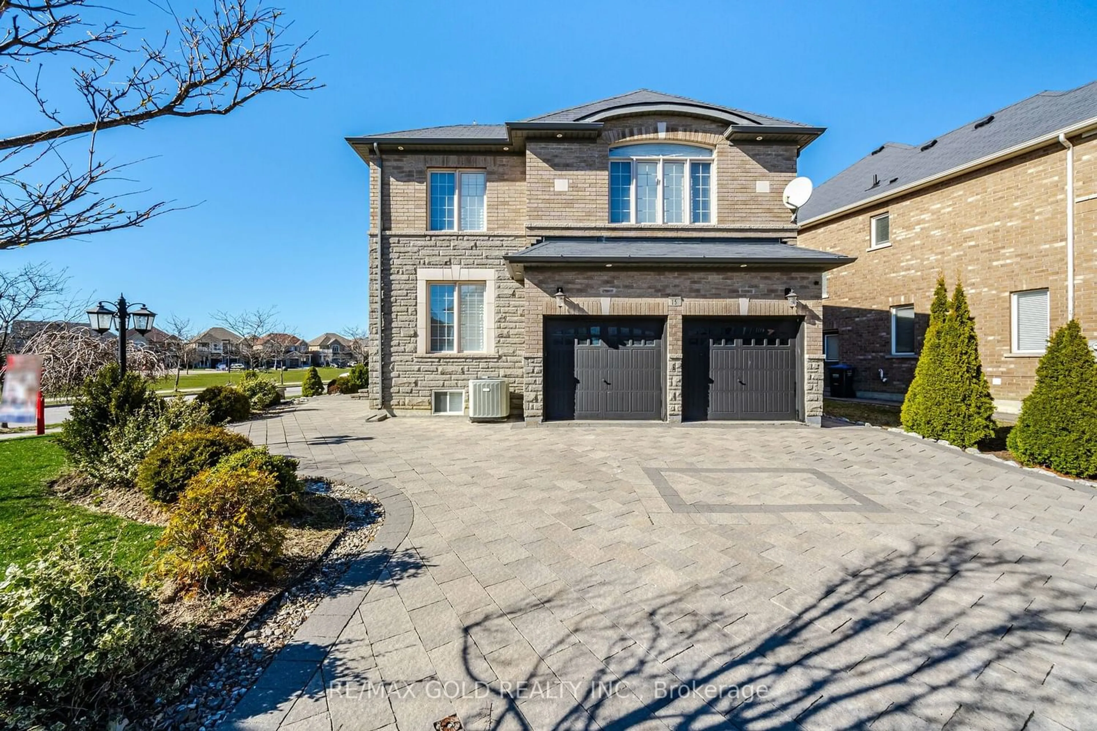 Home with brick exterior material for 15 Gentry Way, Brampton Ontario L6P 3N5