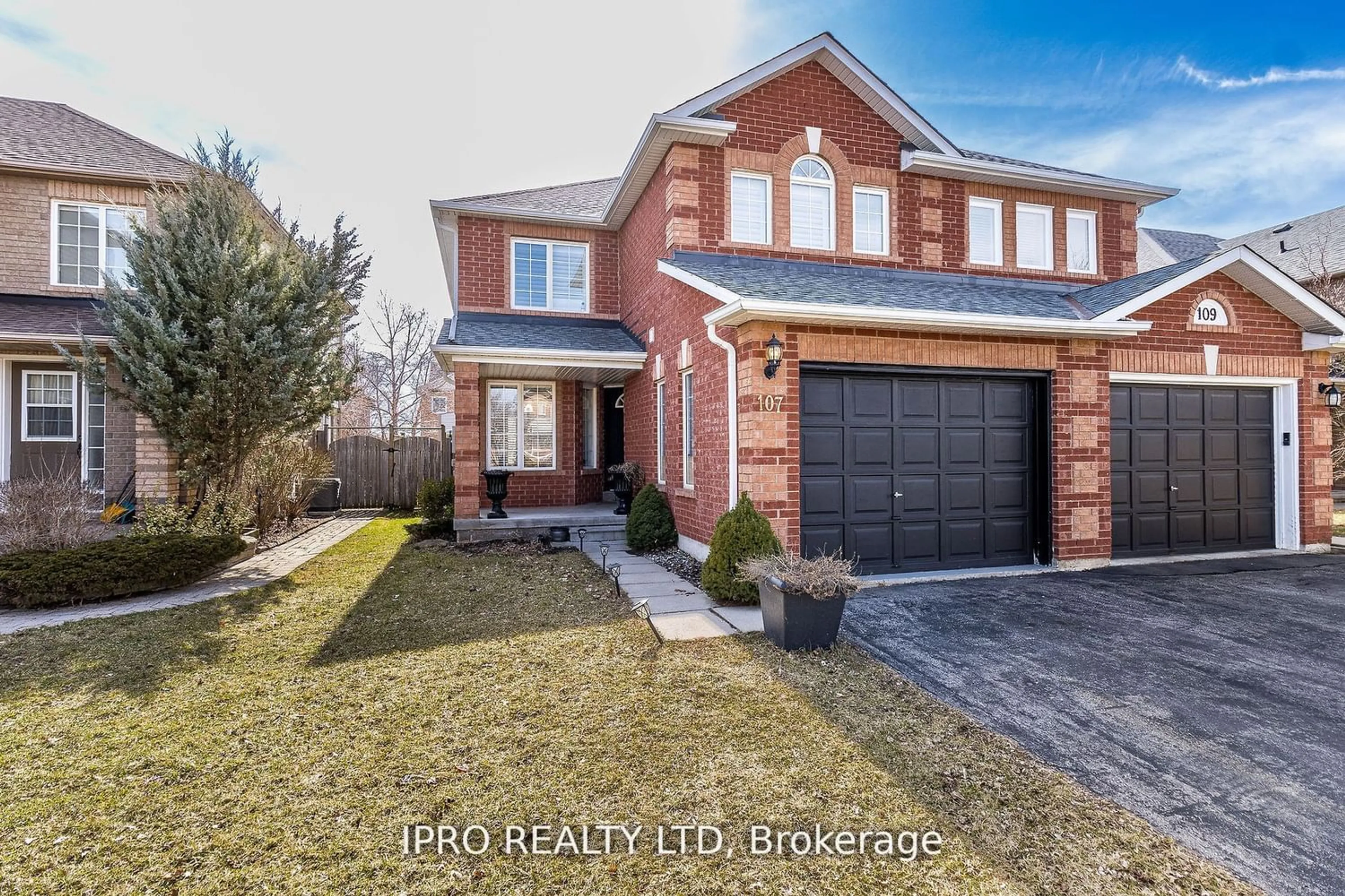 Home with brick exterior material for 107 Mowat Cres, Halton Hills Ontario L7G 6C7