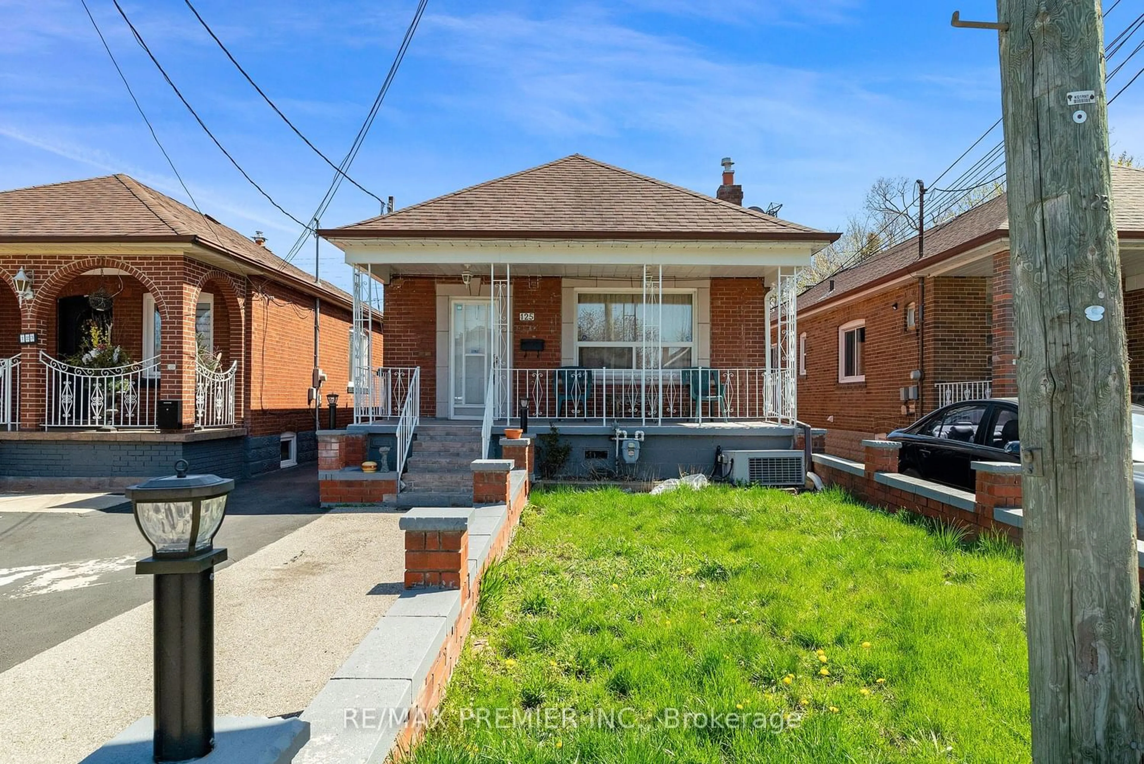 Frontside or backside of a home for 125 Foxwell St, Toronto Ontario M6N 1Y9