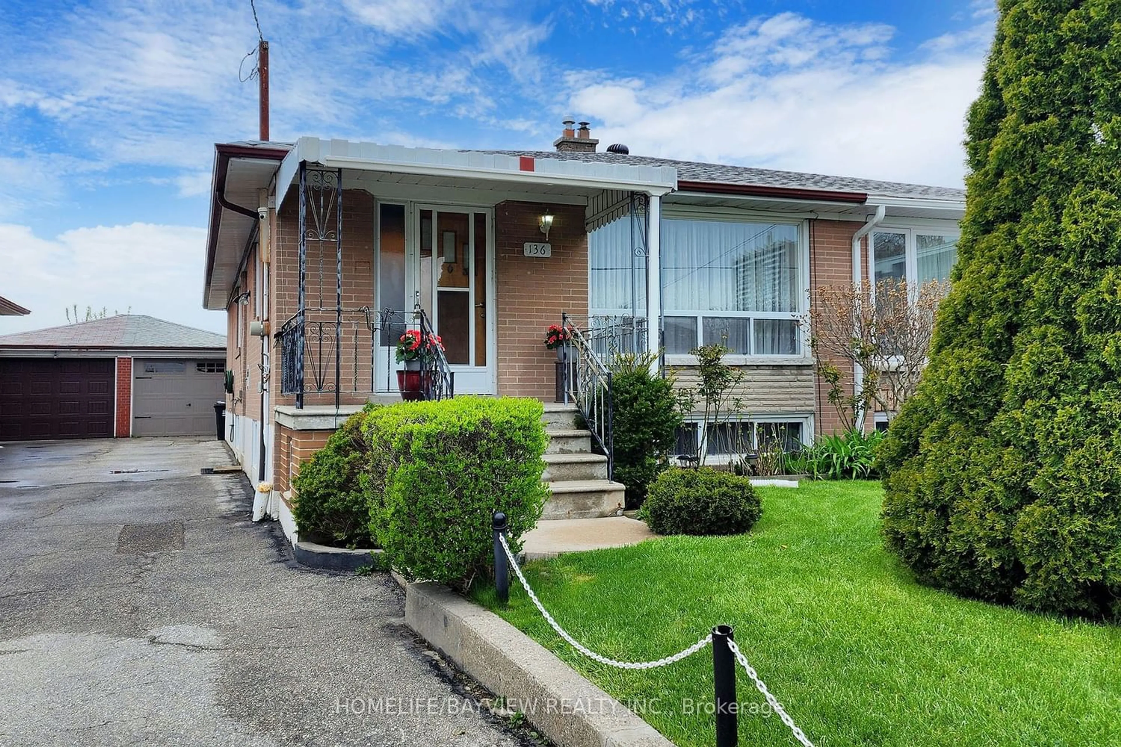 A pic from exterior of the house or condo for 136 Chalkfarm Dr, Toronto Ontario M3L 1L6