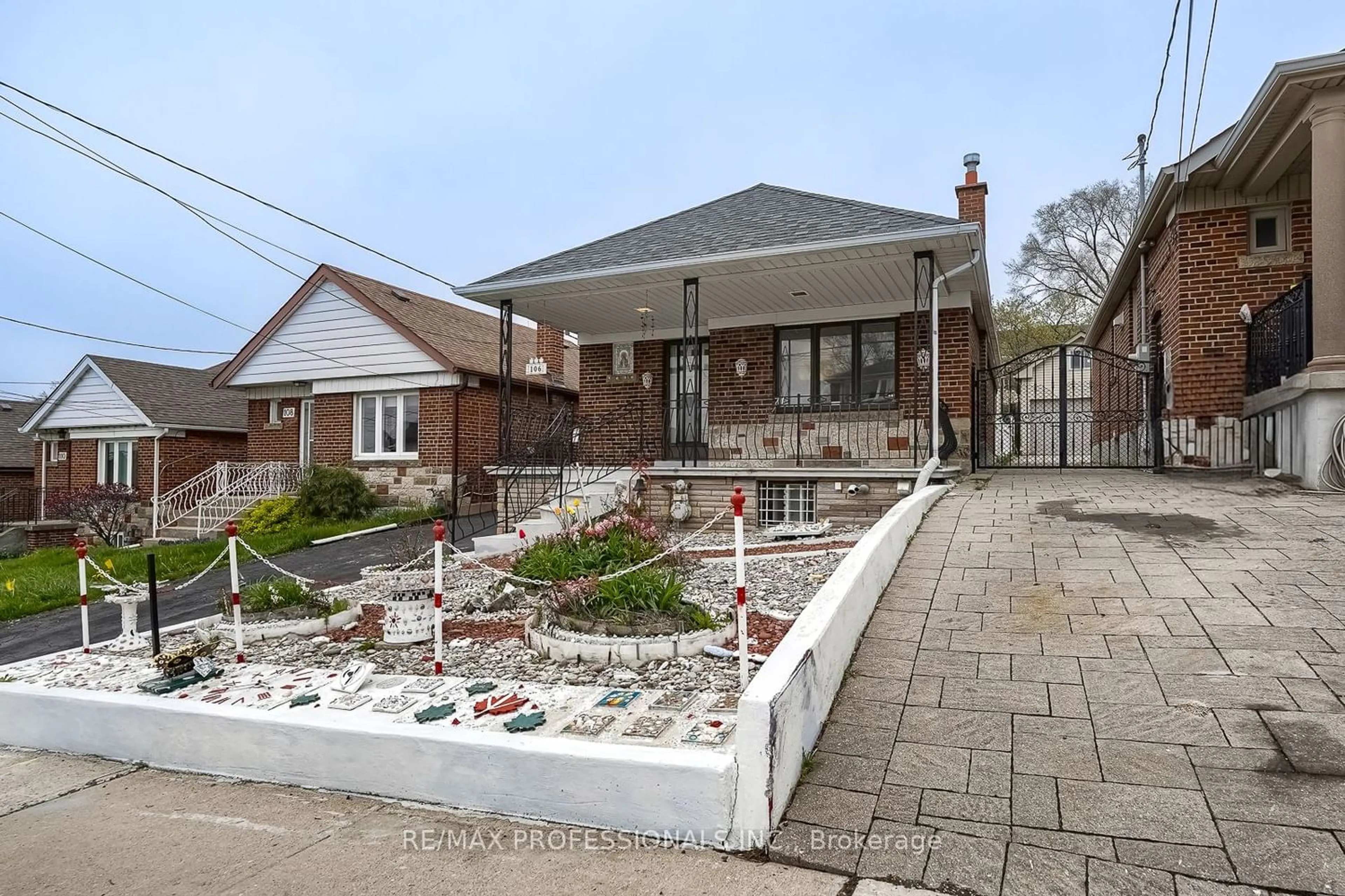 Home with brick exterior material for 106 Cameron Ave, Toronto Ontario M6M 1R3