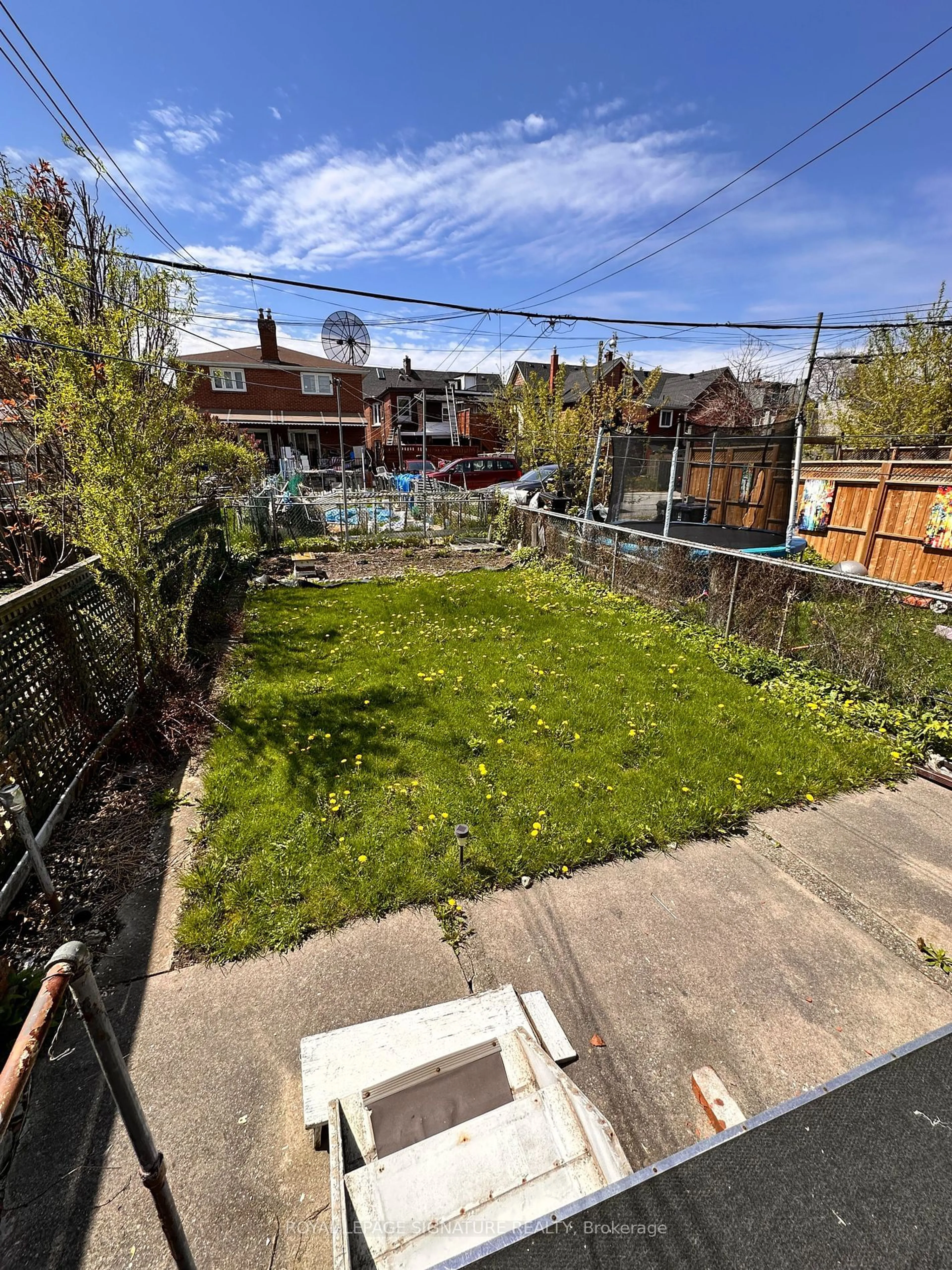 Fenced yard for 44 Carling Ave, Toronto Ontario M6G 3S1