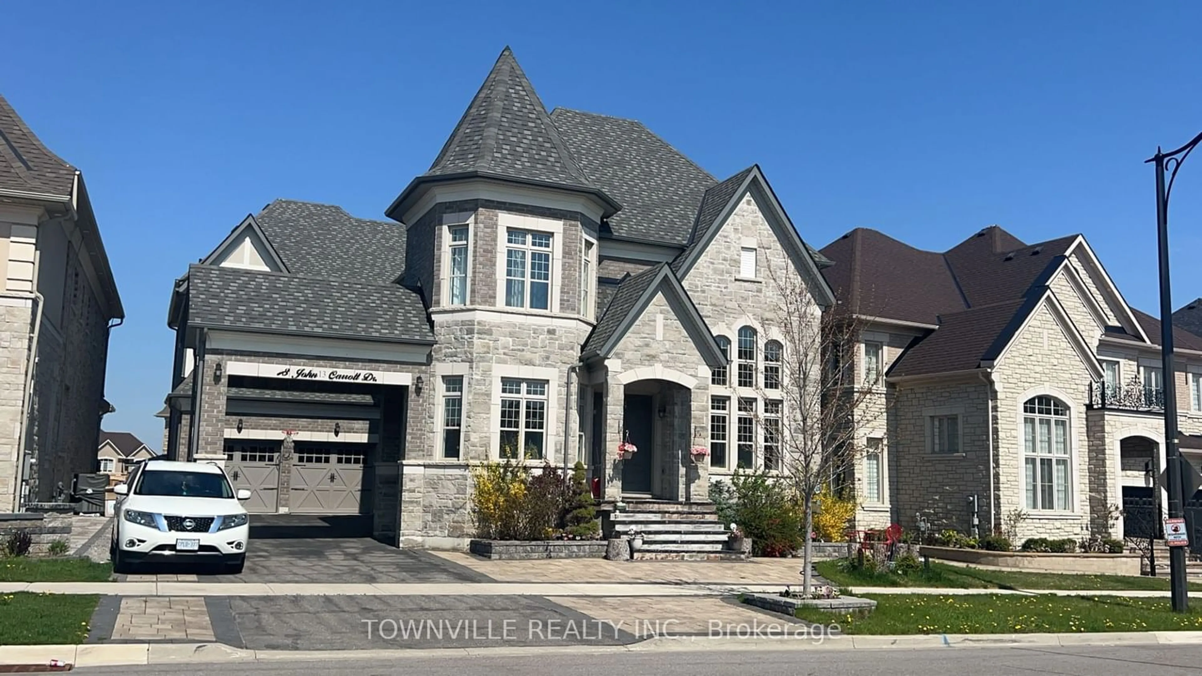 Home with brick exterior material for 13 John Carroll Dr, Brampton Ontario L6P 4K5