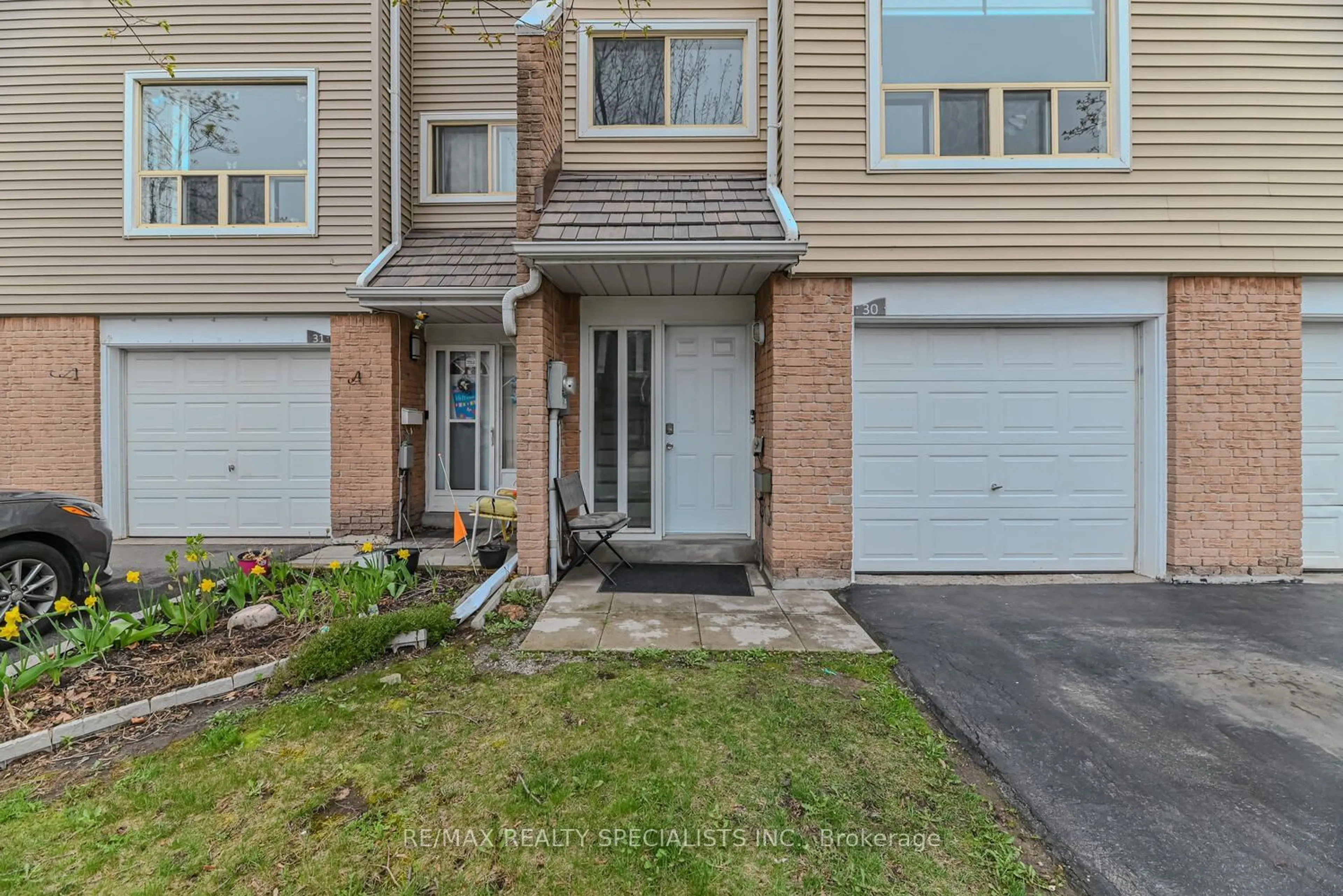 A pic from exterior of the house or condo for 30 Enmount Dr, Brampton Ontario L6T 4C8