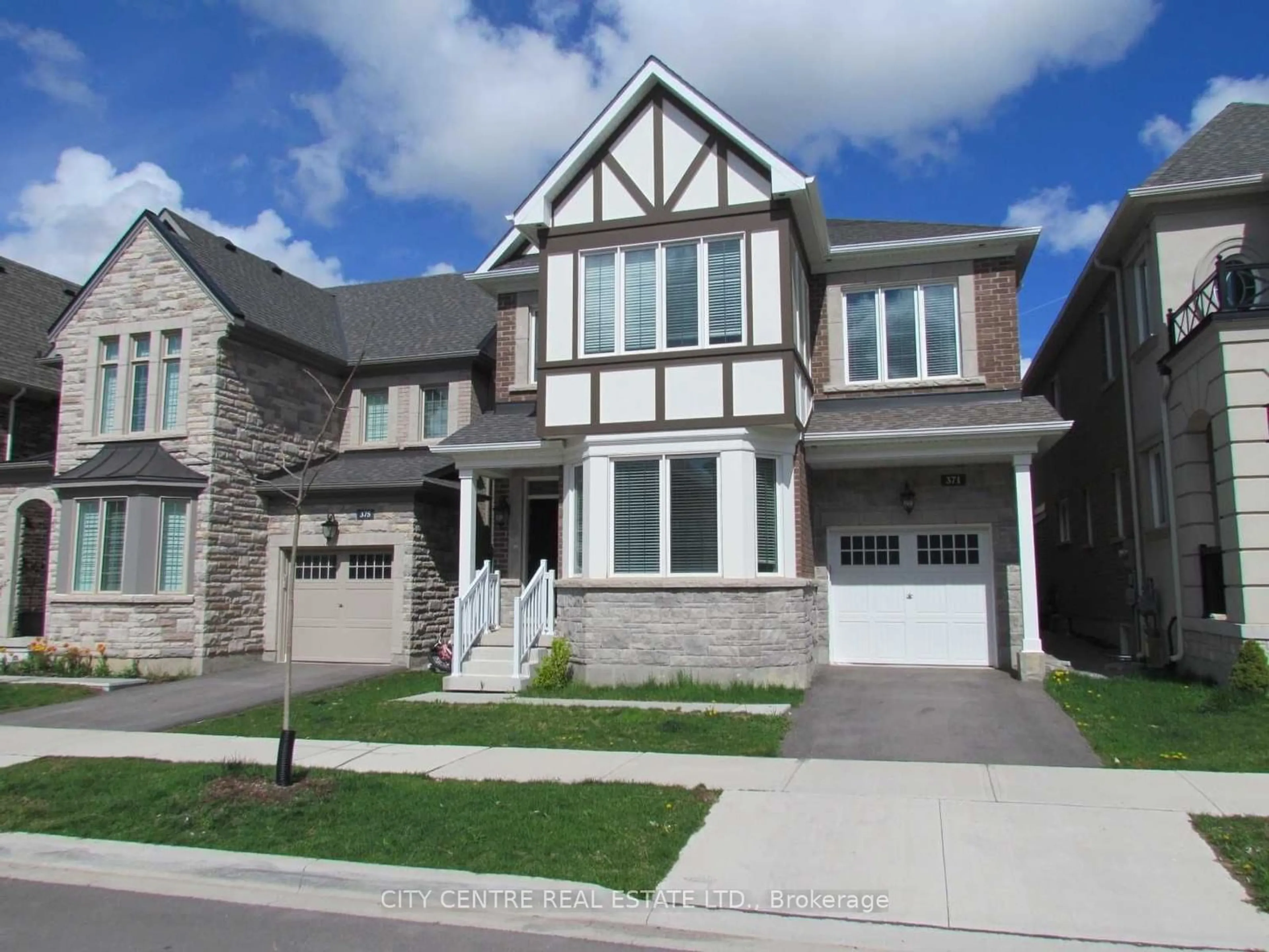 Frontside or backside of a home for 371 Begonia Gdns, Oakville Ontario L6M 1L7