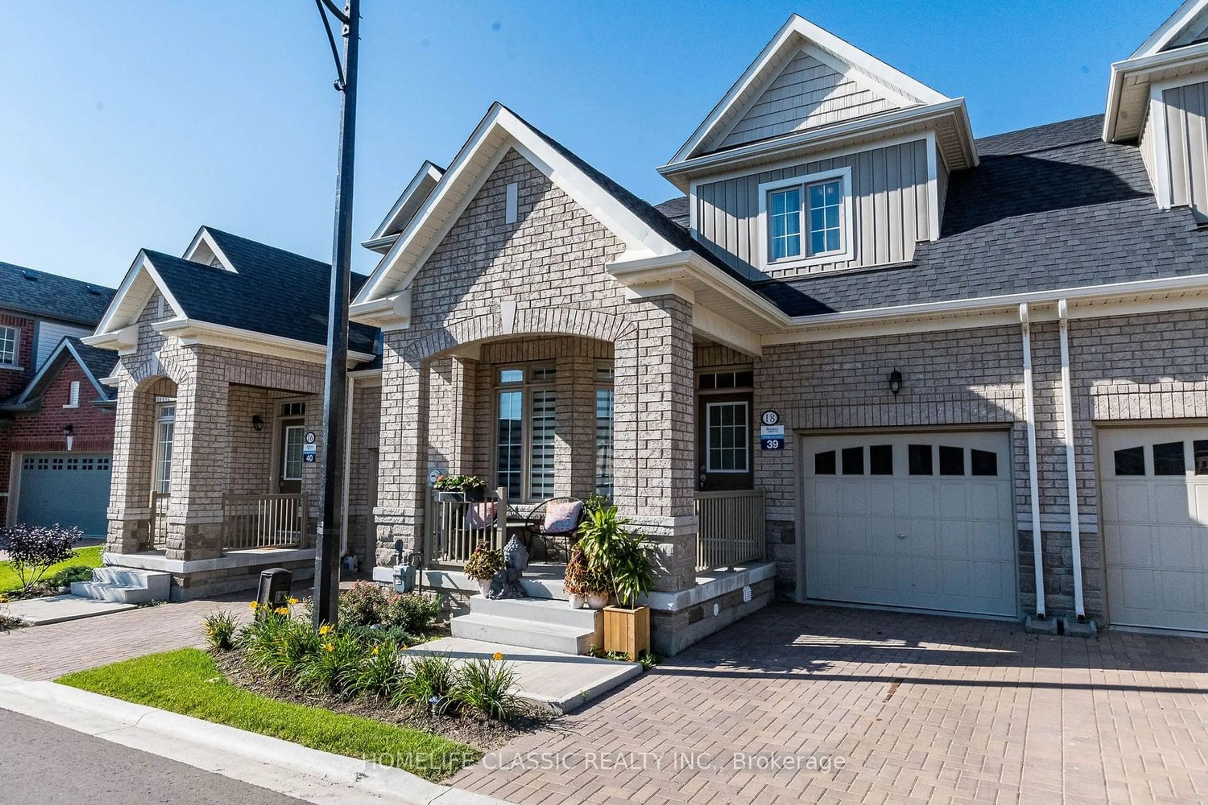 Home with brick exterior material for 18 Bluestone Cres, Brampton Ontario L6R 4B8