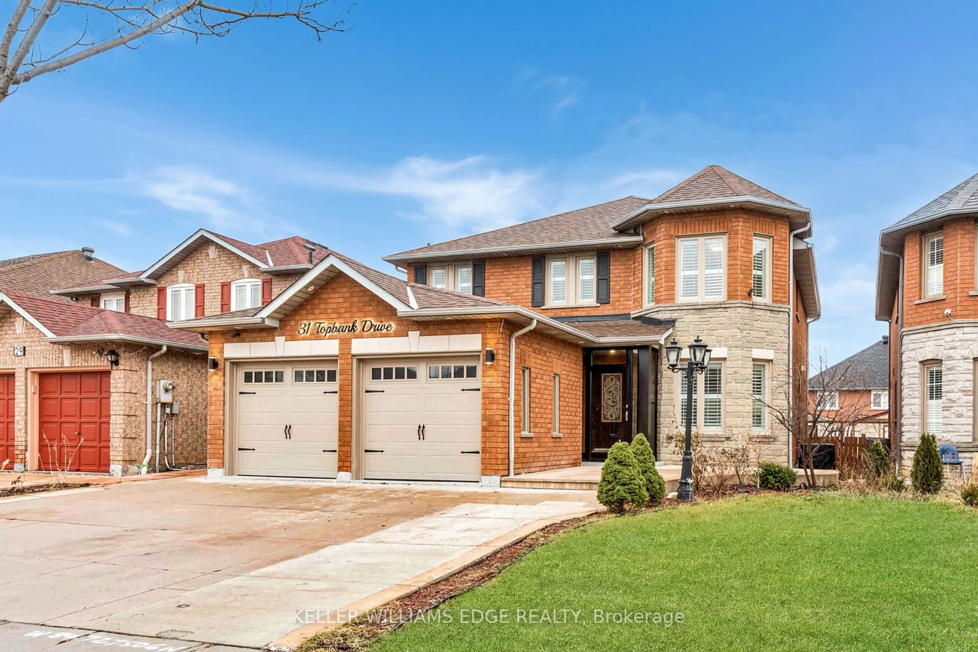 Home with brick exterior material for 31 Topbank Dr, Toronto Ontario M9W 7B8