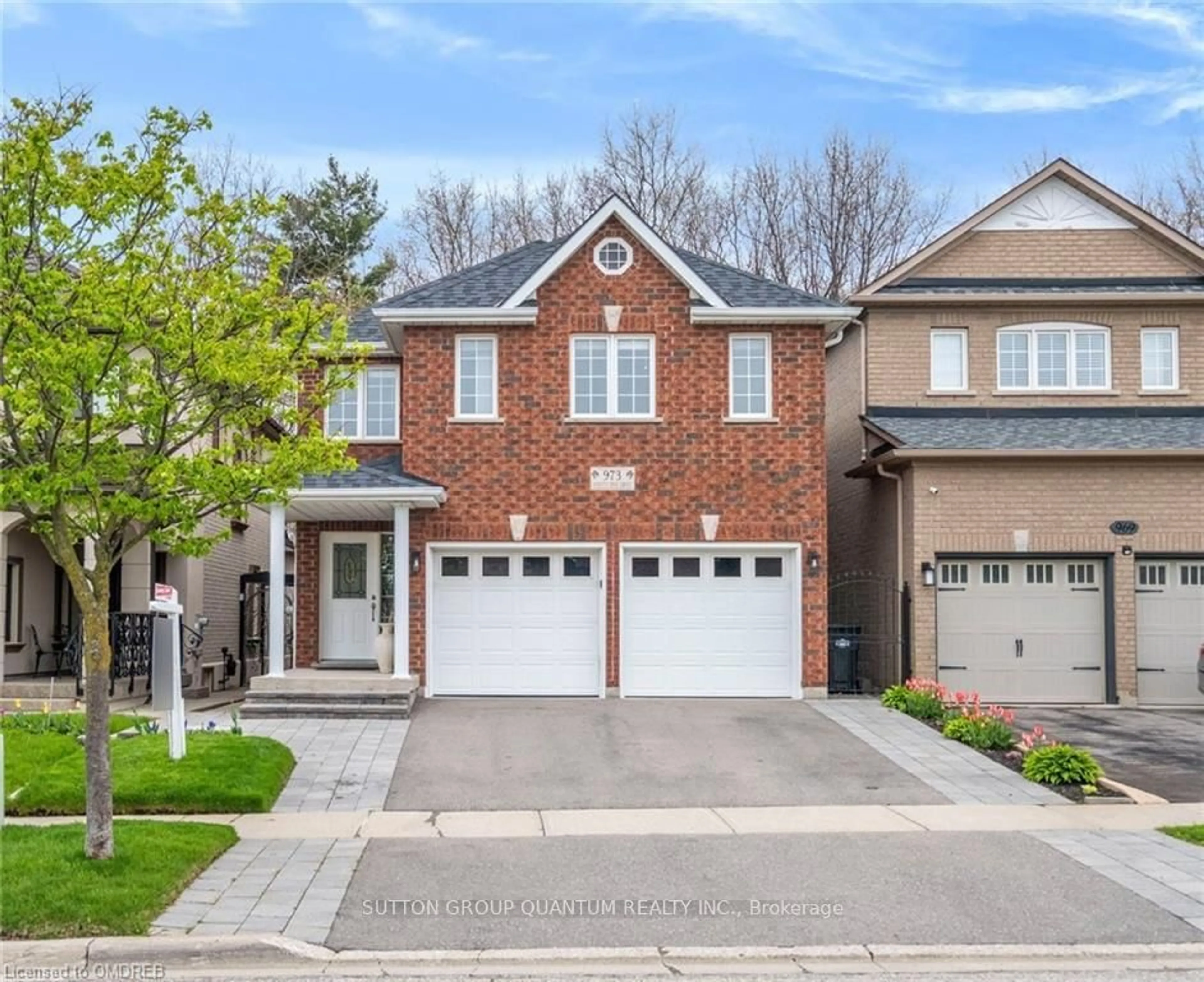 Home with brick exterior material for 973 Knotty Pine Grve, Mississauga Ontario L5W 1J9