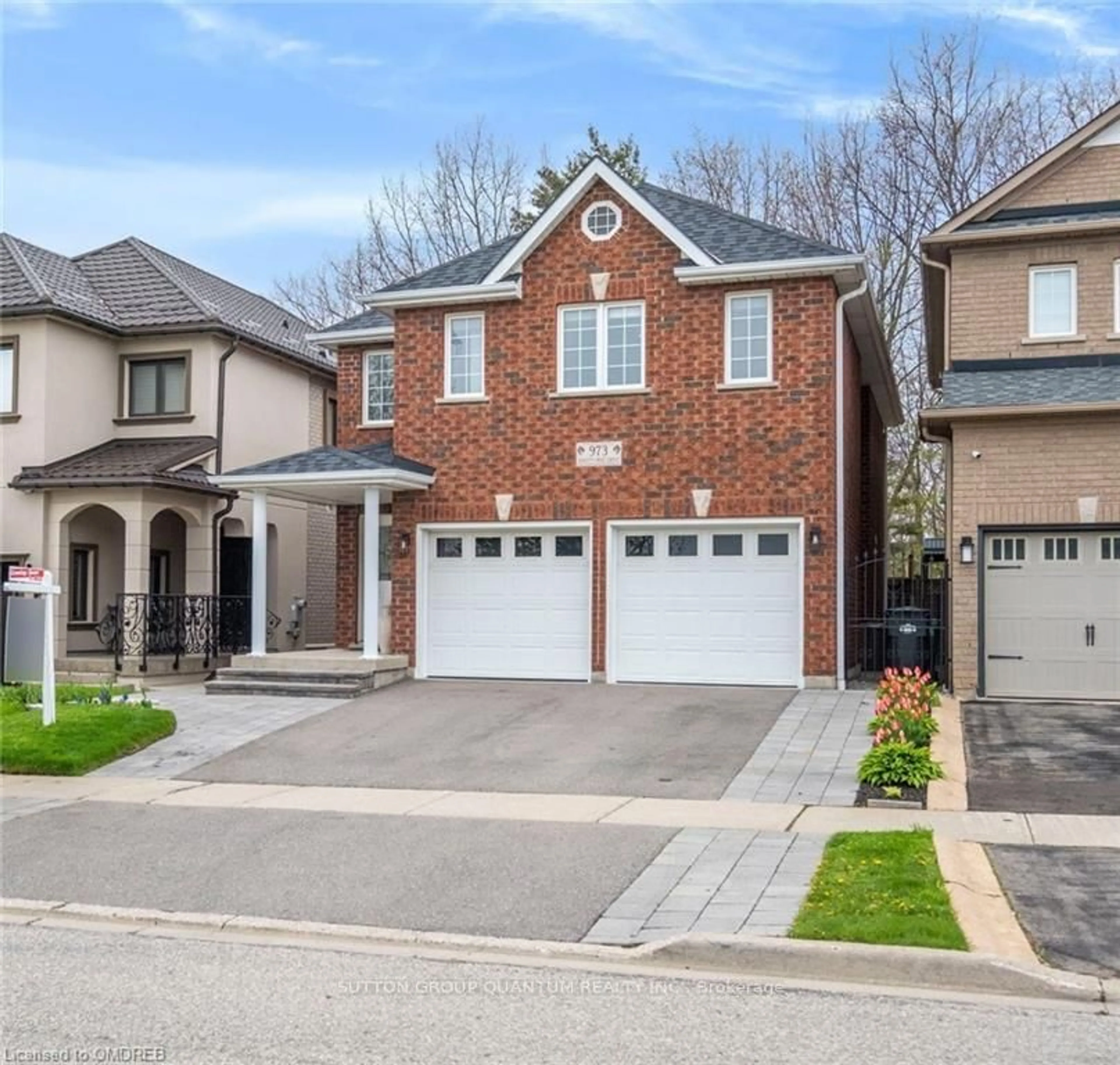 Home with brick exterior material for 973 Knotty Pine Grve, Mississauga Ontario L5W 1J9
