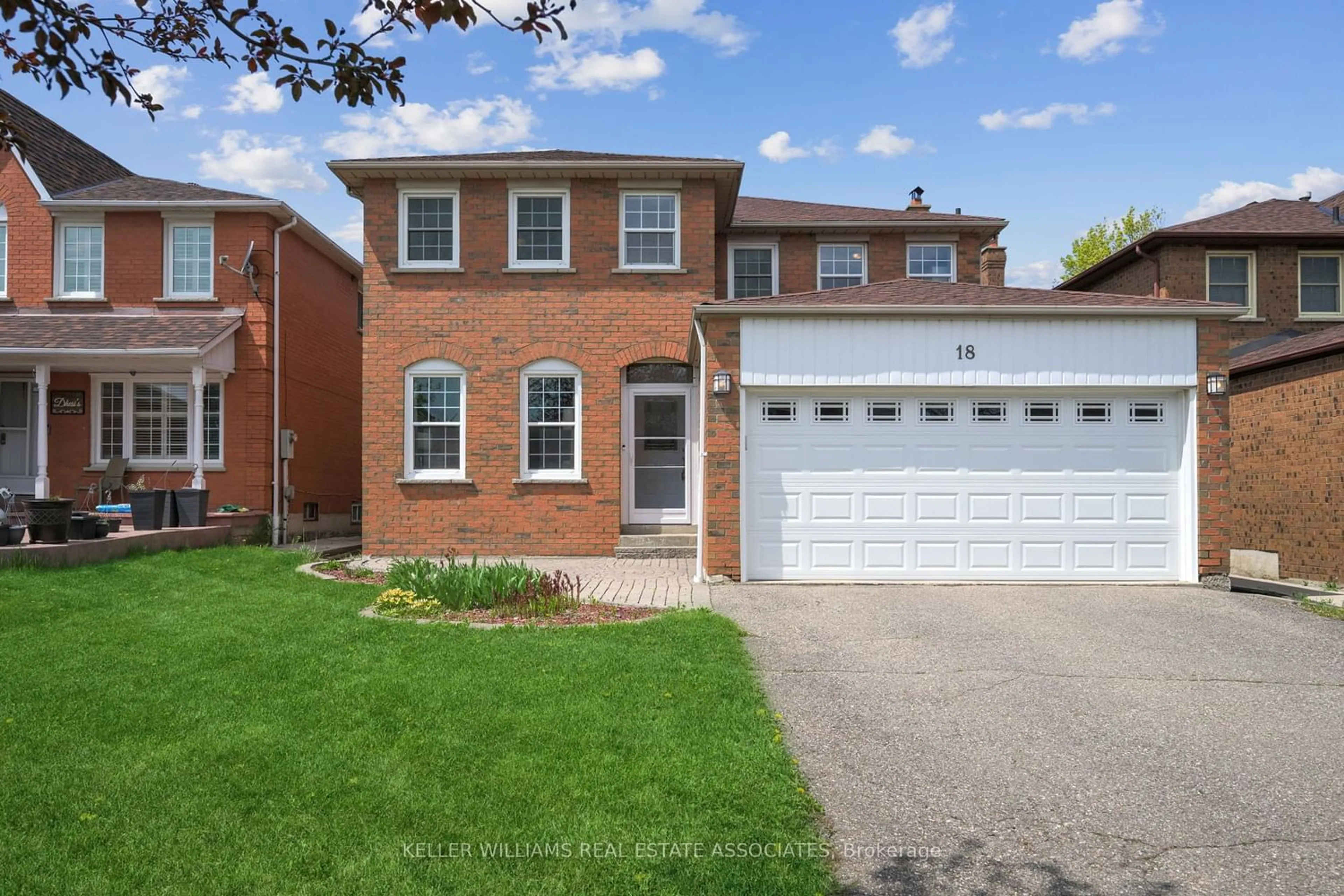 Home with brick exterior material for 18 Napanee St, Brampton Ontario L6S 4X7