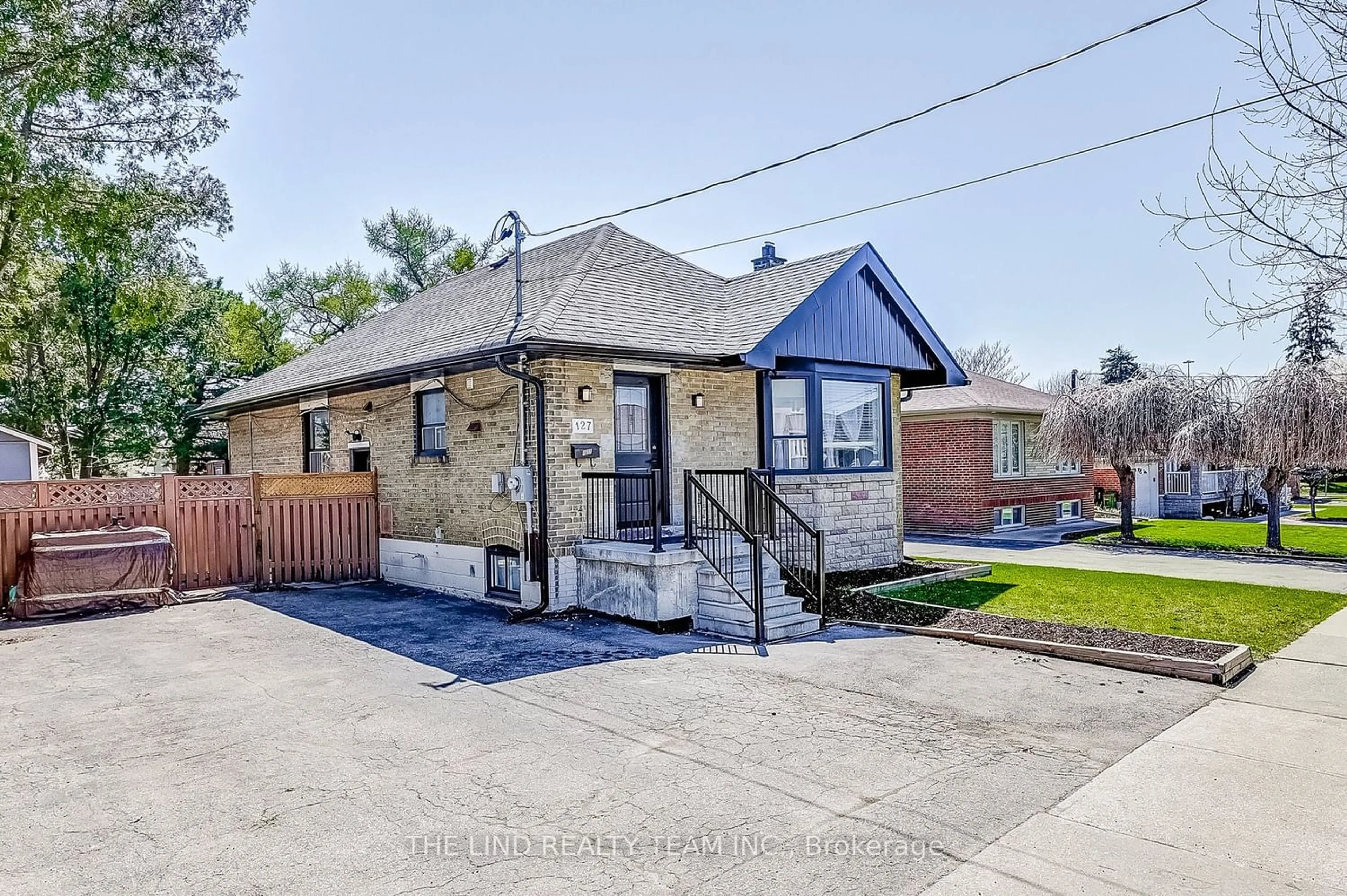 Frontside or backside of a home for 127 Rustic Rd, Toronto Ontario M6L 1V9
