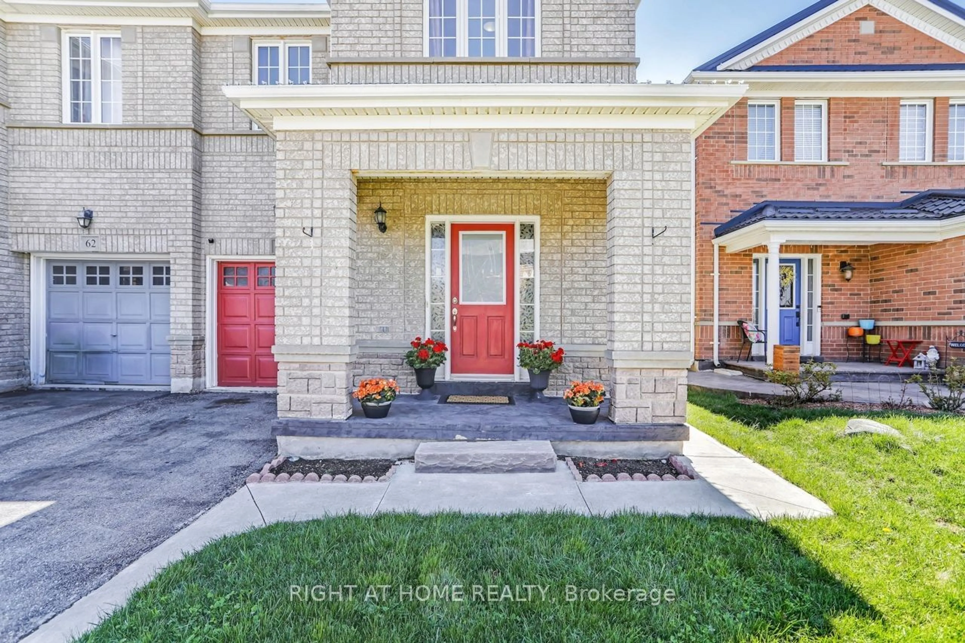 Home with brick exterior material for 64 Hollingsworth Circ, Brampton Ontario L7A 0J4