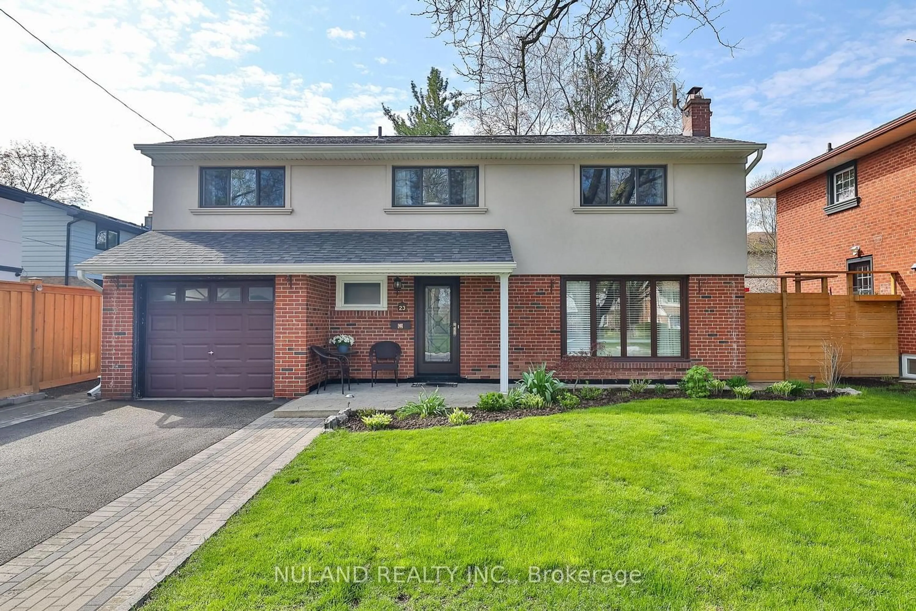 Home with brick exterior material for 23 Glos Rd, Toronto Ontario M9C 3A1