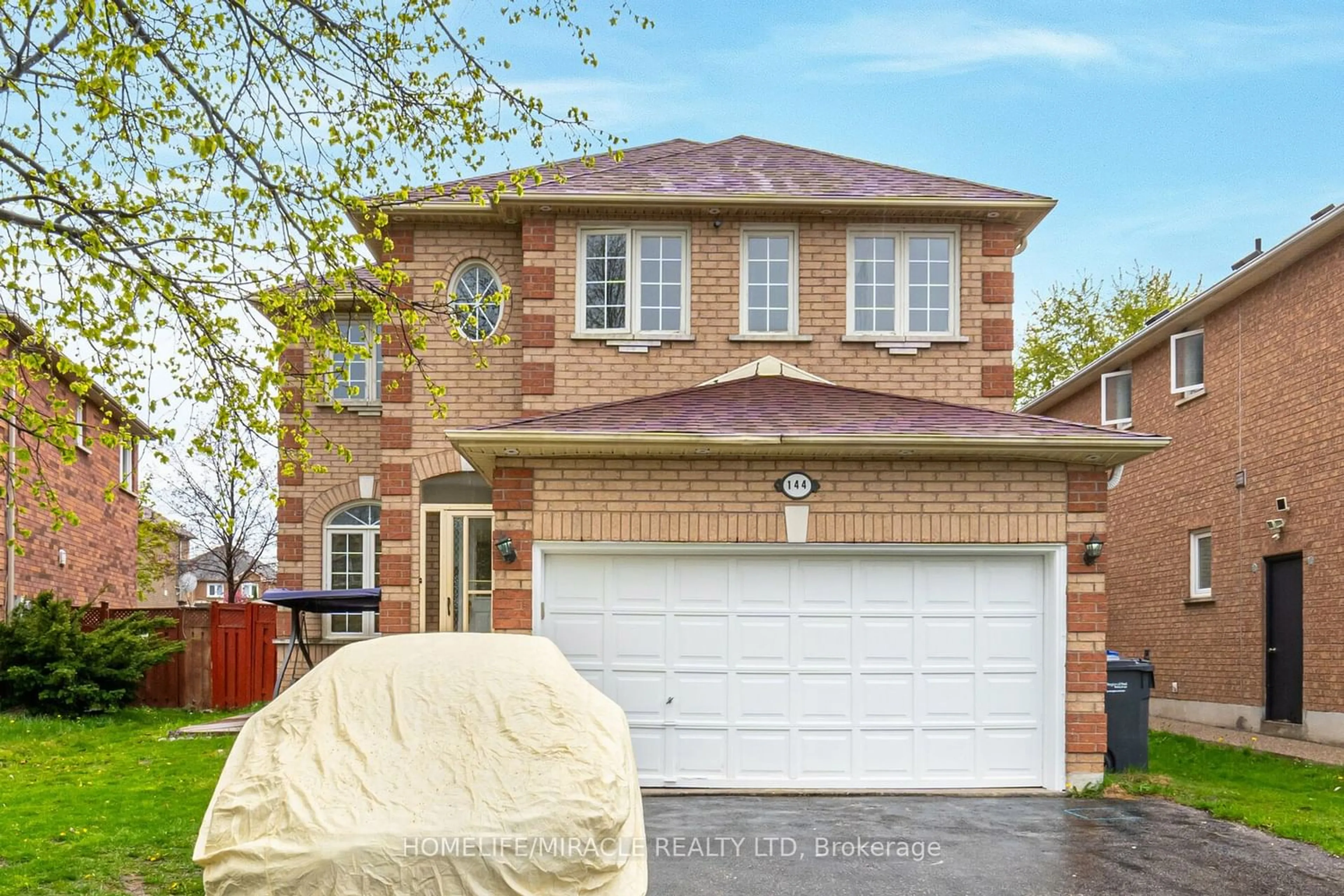 Home with brick exterior material for 144 Lockwood Rd, Brampton Ontario L6Y 4Z2