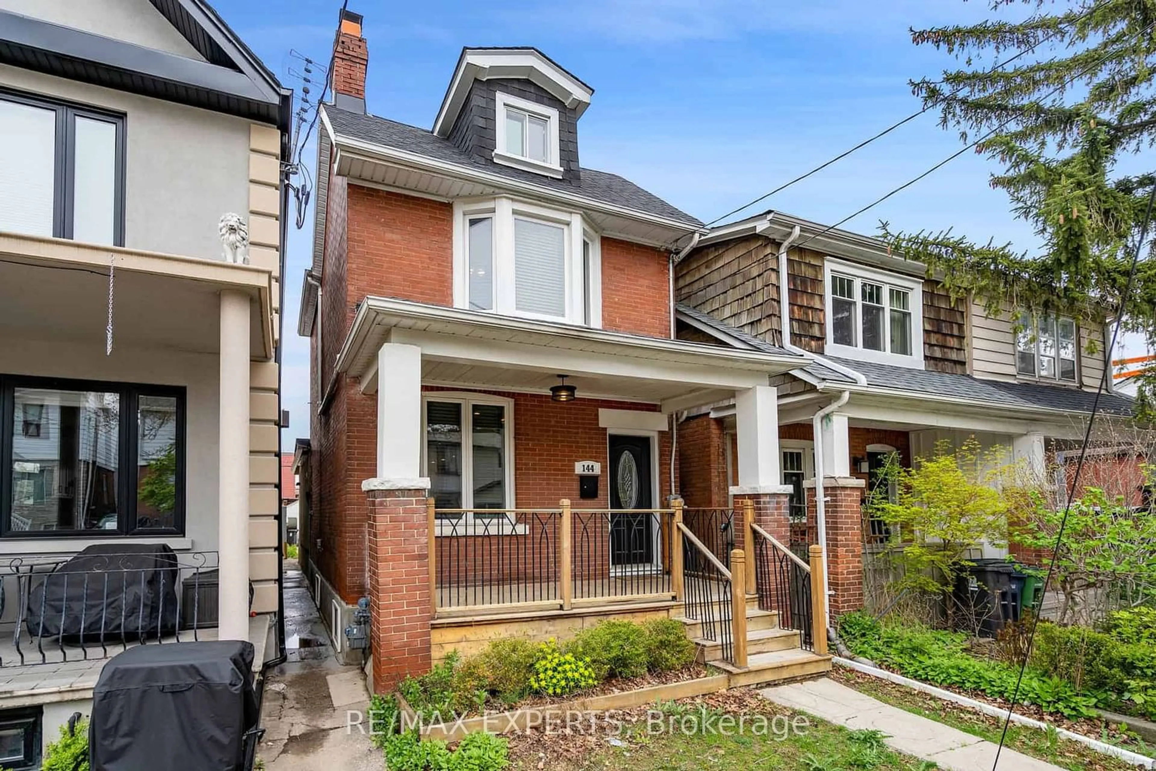 Home with brick exterior material for 144 Morrison Ave, Toronto Ontario M6E 1M4